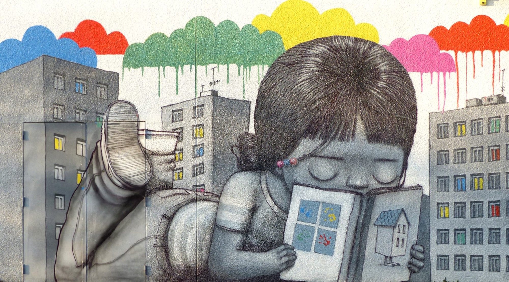 Children with colorful clouds — Street art by Seth in Fleury-les-Aubrais