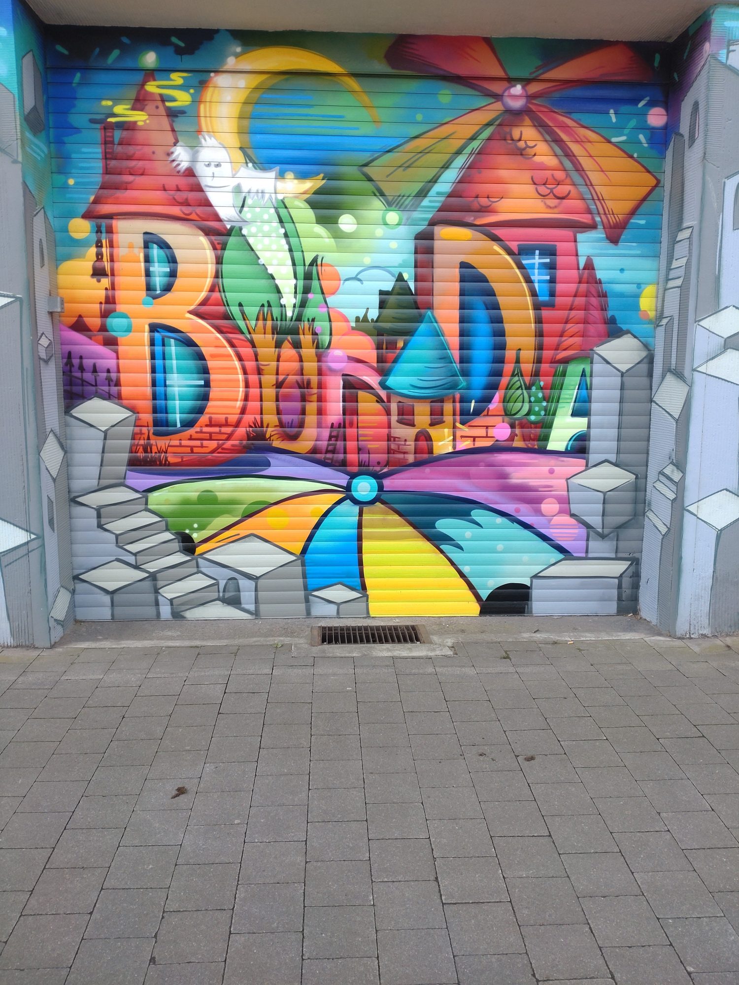 Porte de garage aux maisons-champignons — Street art à Saarbrücken