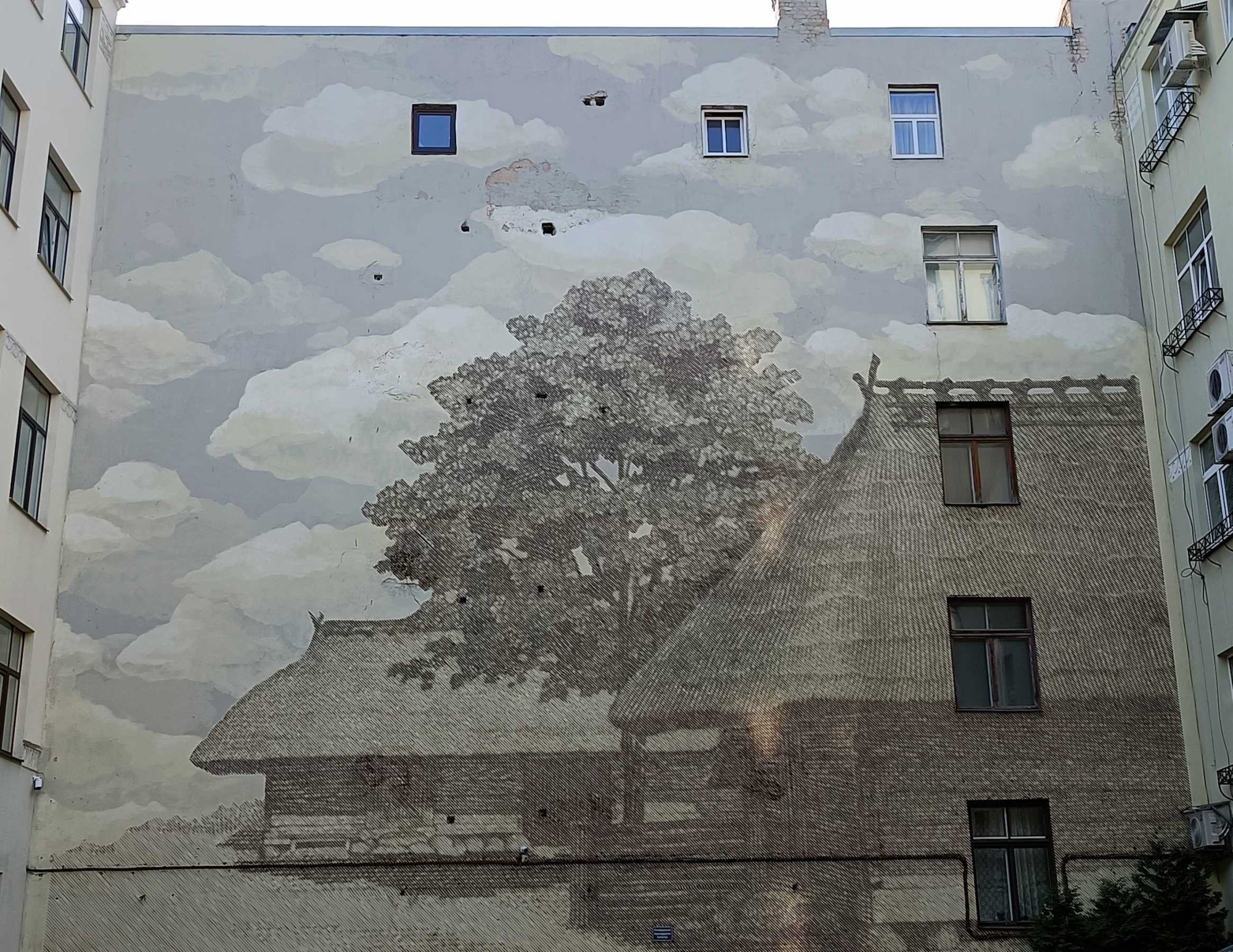 Trompe-l'œil, maison et arbre sur façade — Street art de Rudens Stencil à Rīga