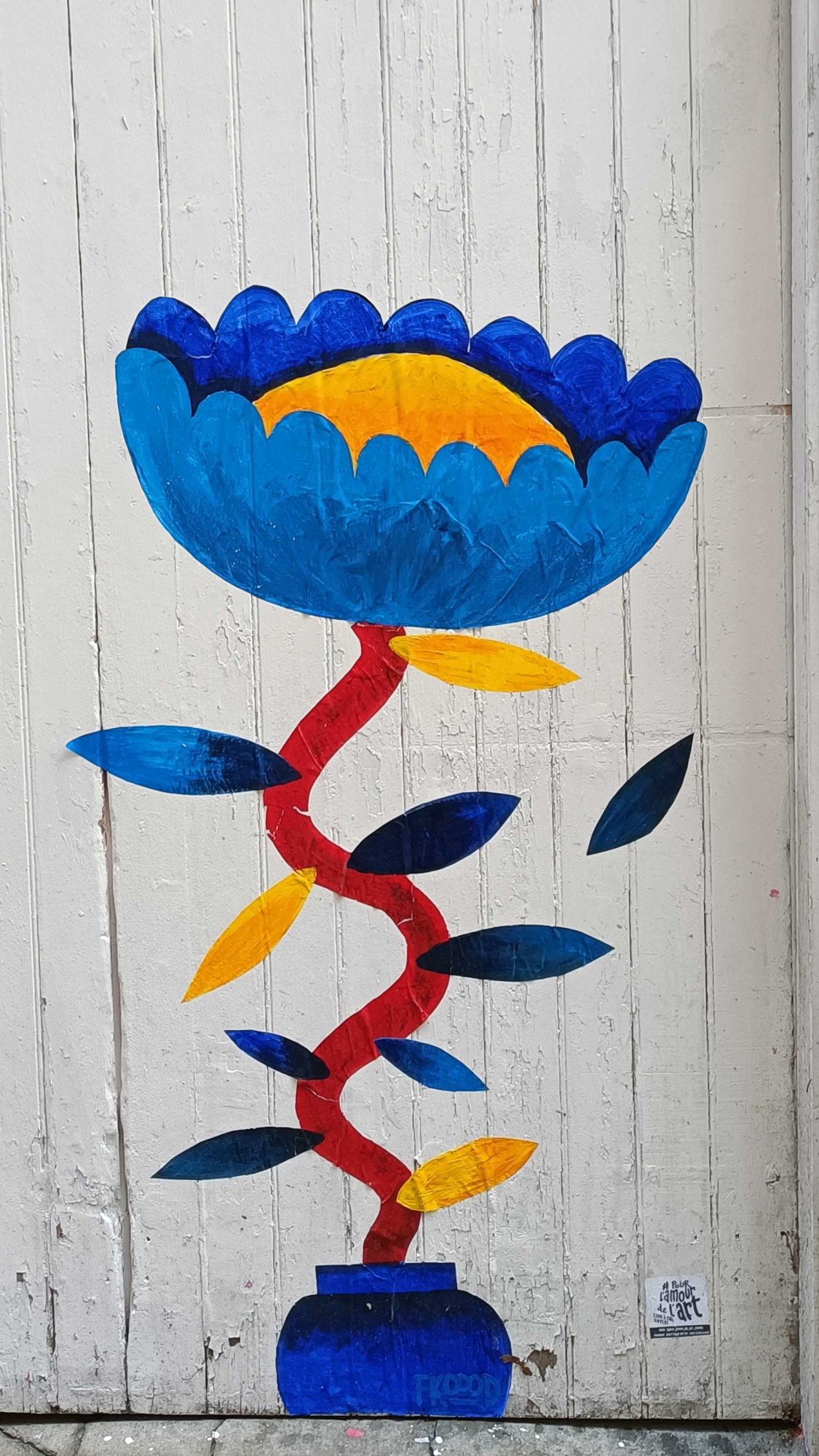 Blue Flower with Twisted Red Stem — Street art in Nantes