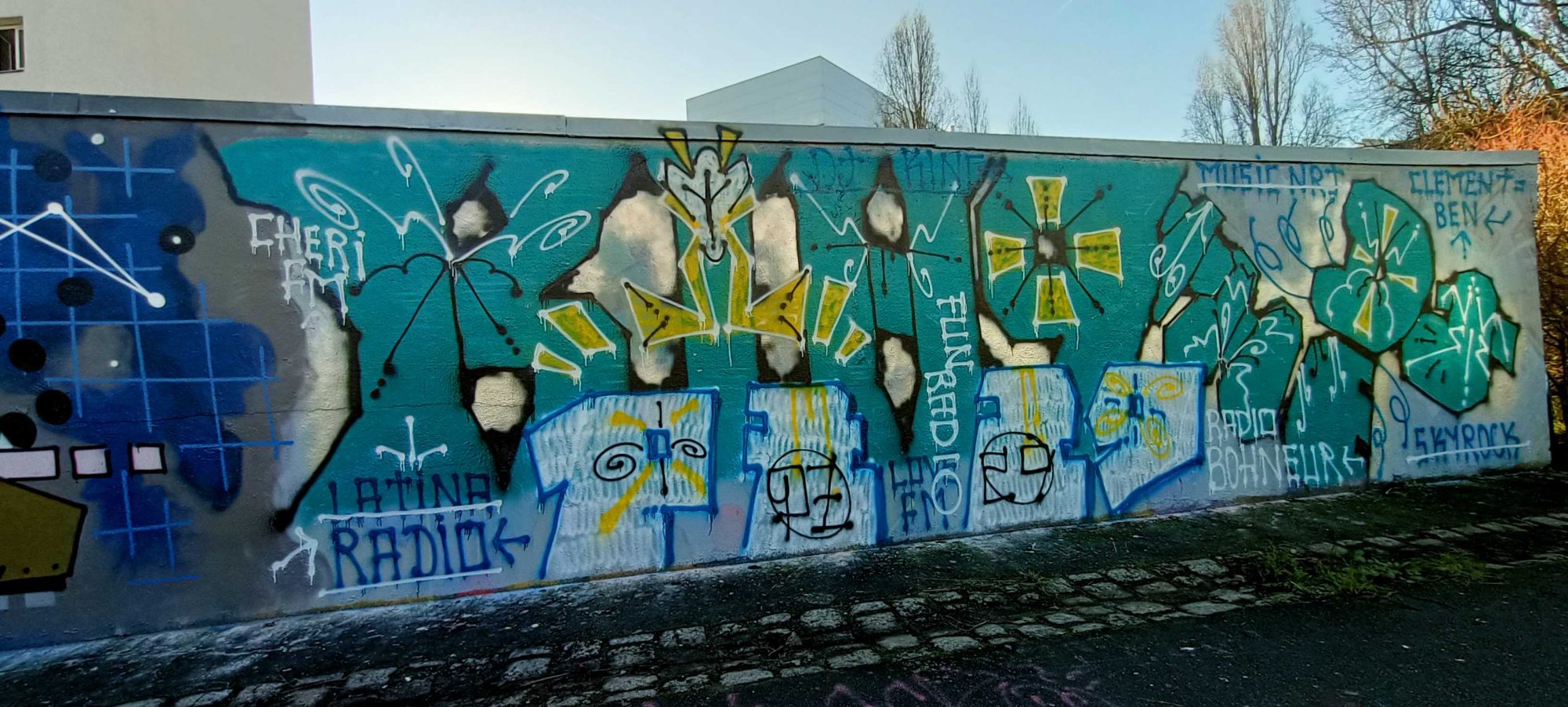 The Turquoise Latino Radio Wall — Street art in Nantes