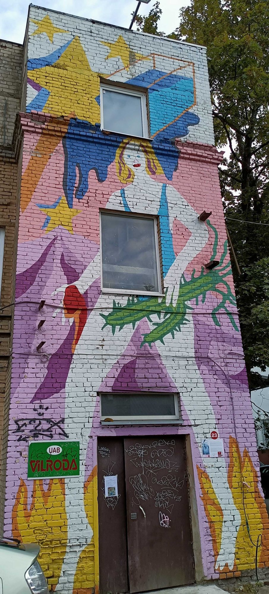 Woman with Thorny Branches — Street art by Egle Zvirblyte in Vilnius