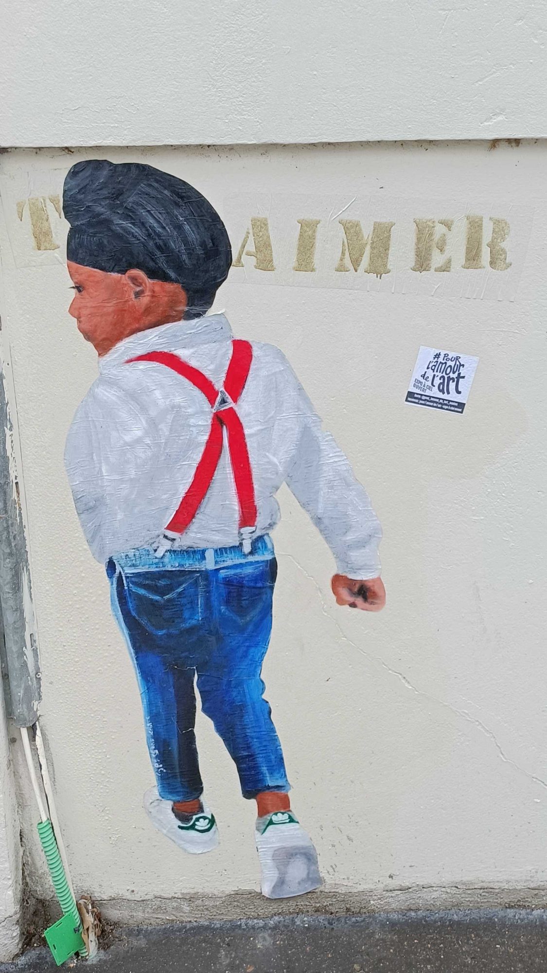 Child from Behind and the Word Love — Street art in Nantes