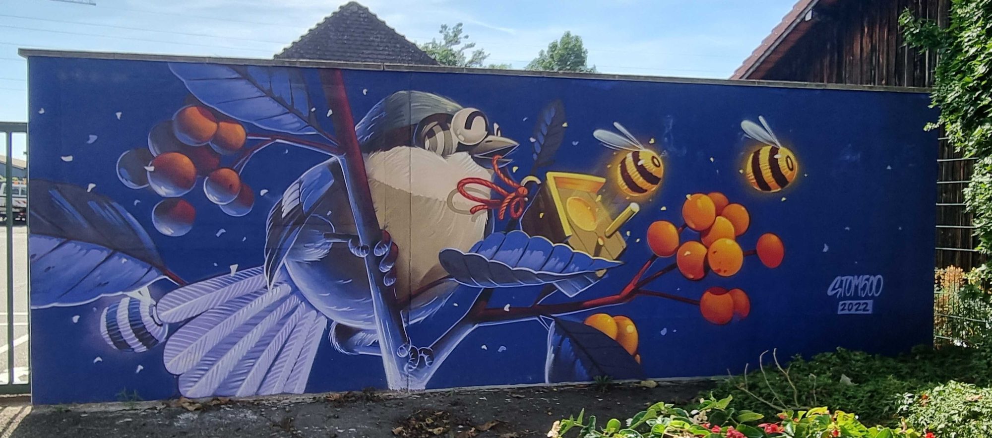 The Horn Player and the Bees — Street art by Stom500 in Strasbourg