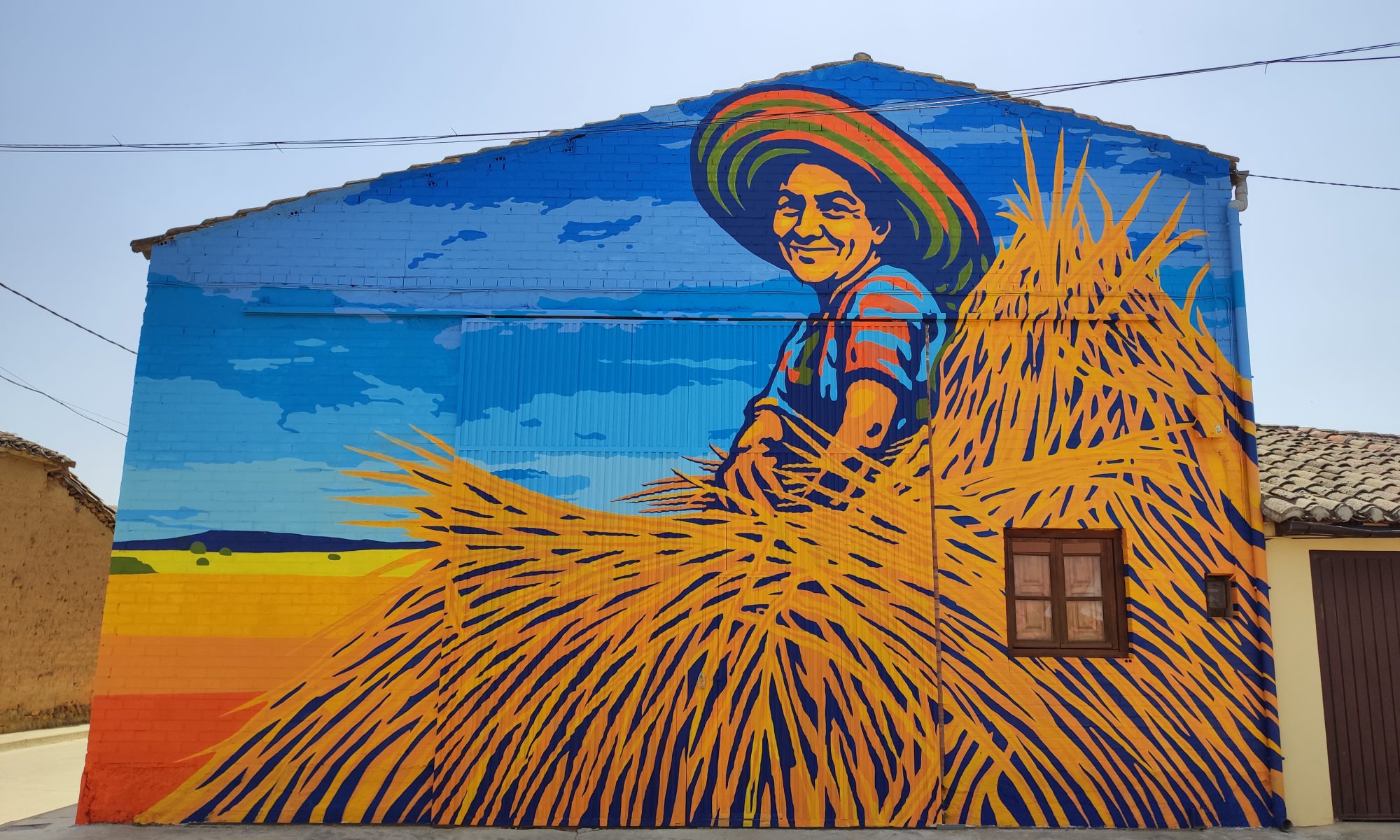 LA MUJER Y EL CAMPO — Street art à Polvorosa de Valdavia
