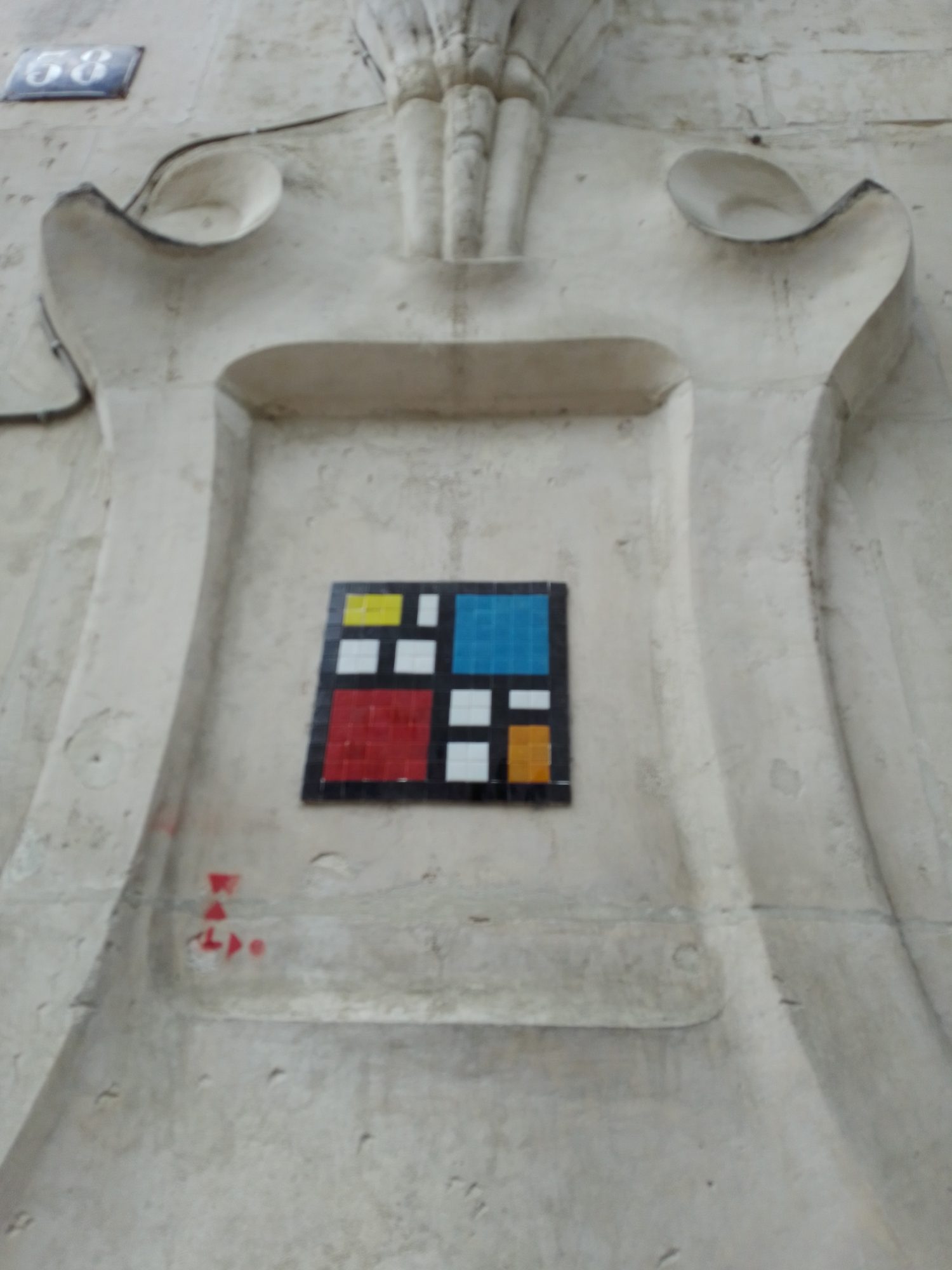 Mondrian Mosaic in the Carved Recess — Street art by Waldo in Angers