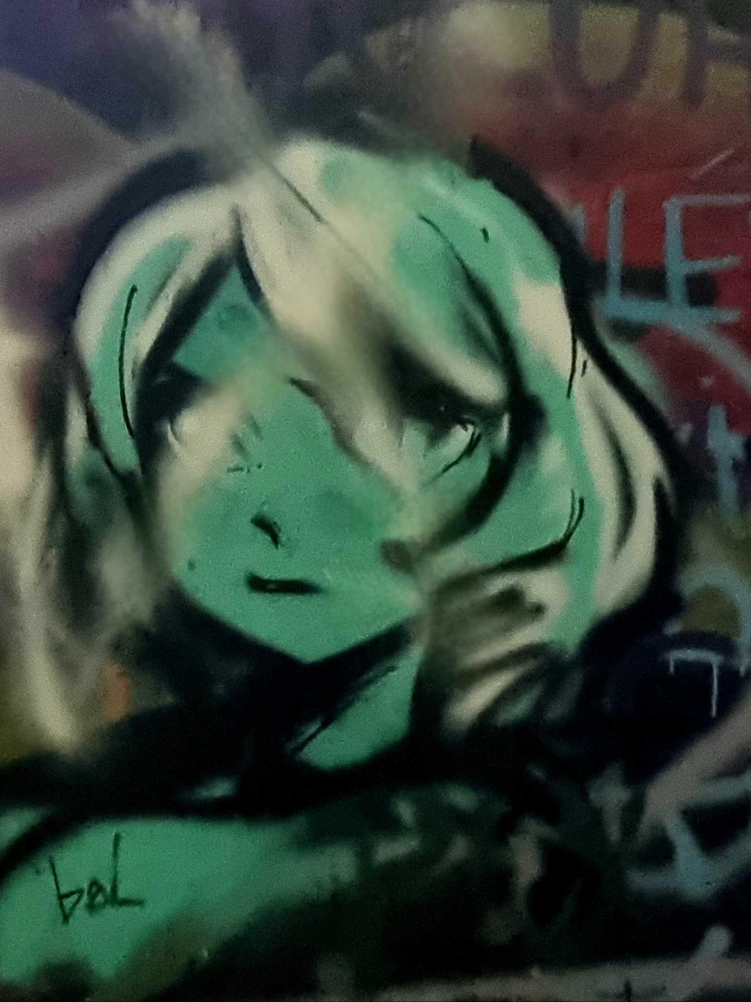Green Face with Lowered Gaze — Street art in Grenoble