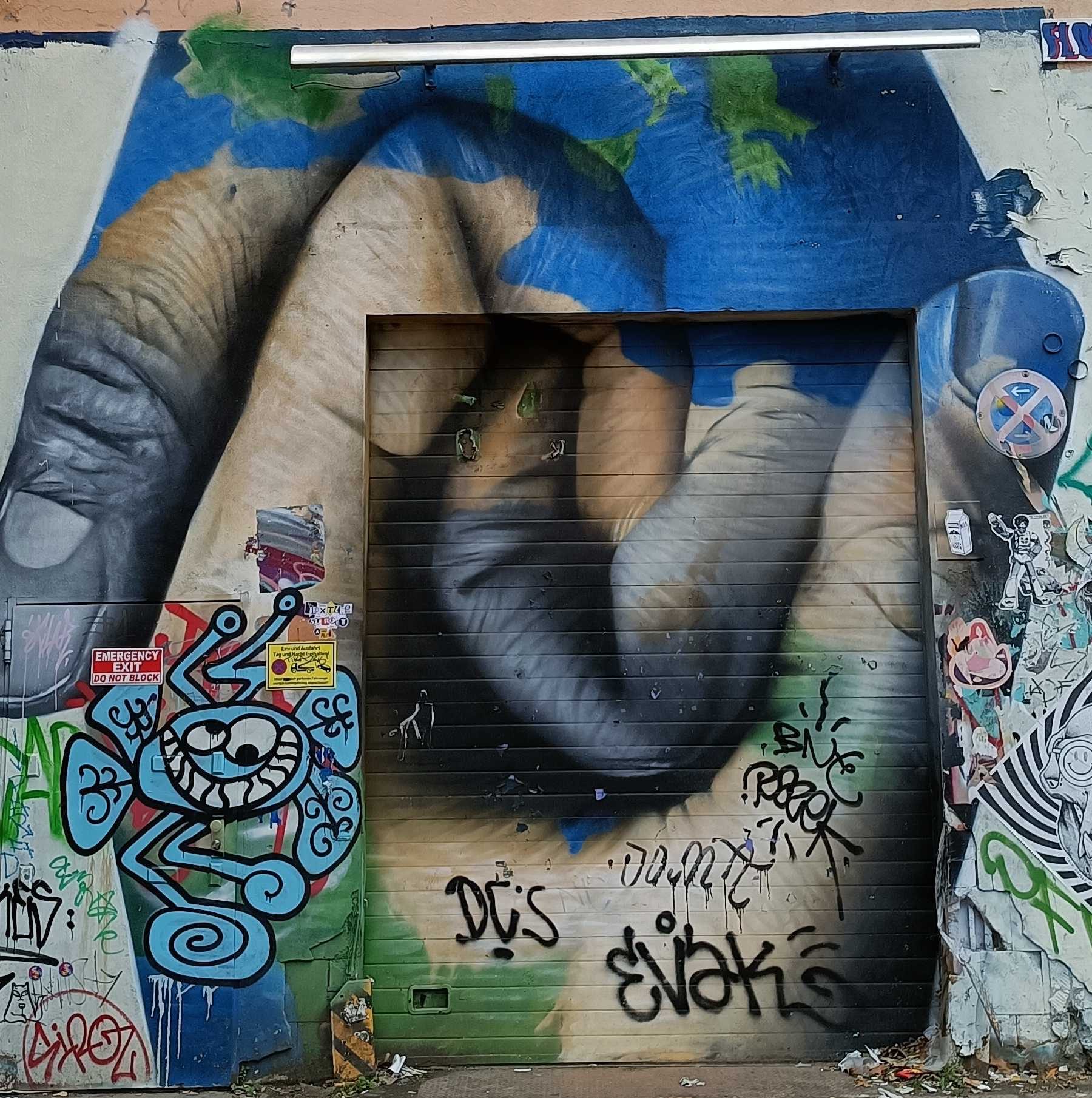 Giant Hand Trompe-l'Oeil on Door — Street art by MATE in Berlin