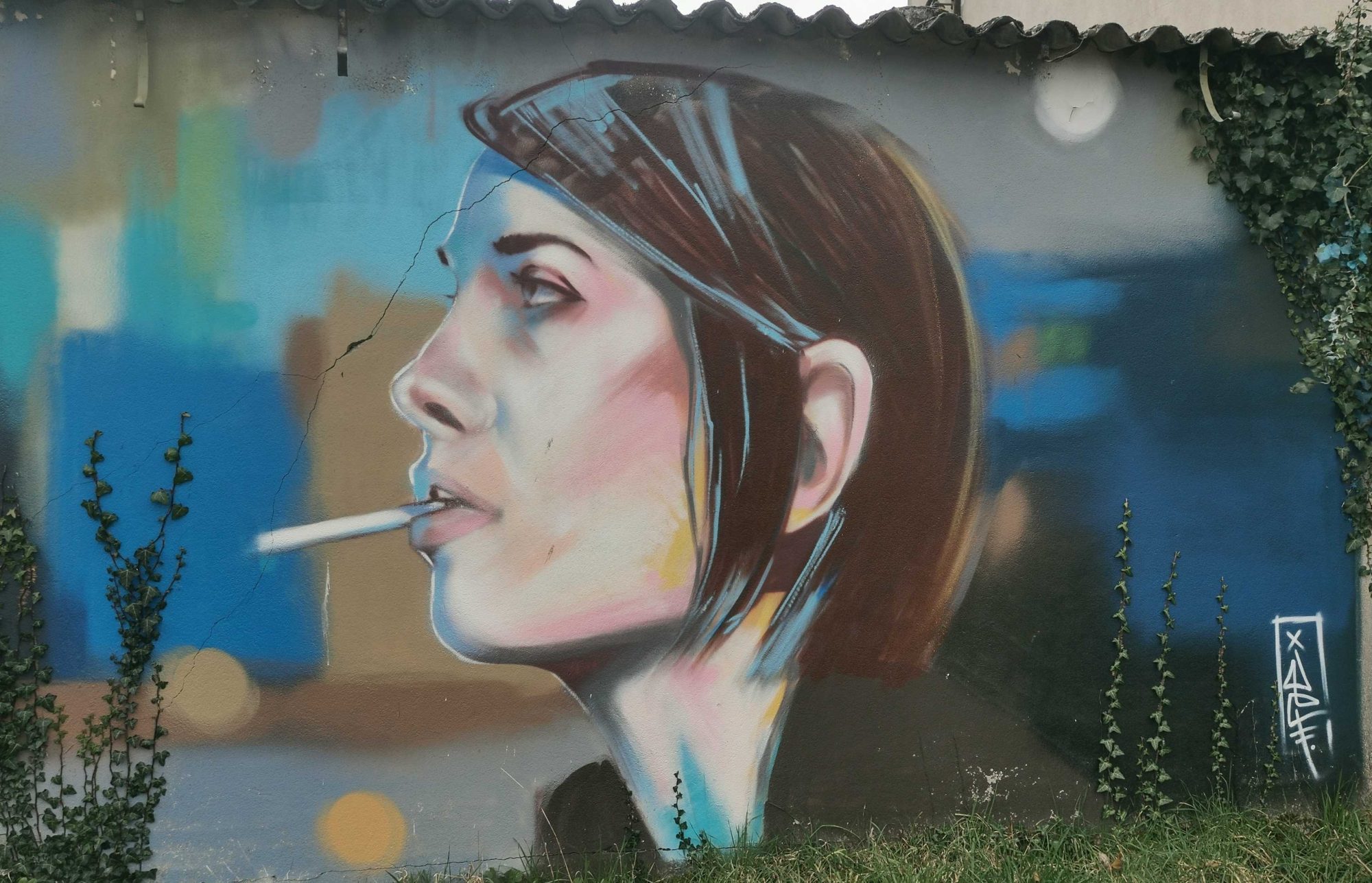 Young Girl with Cigarette — Street art by Jef in Saint-Nicolas-de-Redon