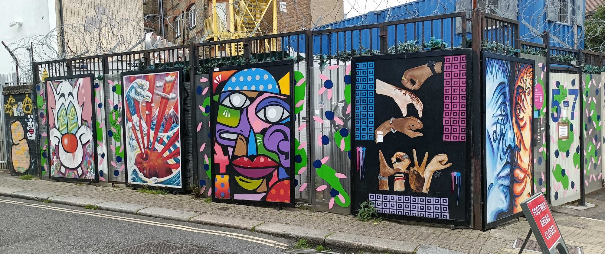 Painted Panels on the Hoarding — Street art in London