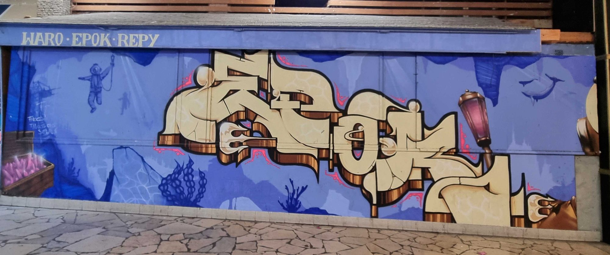 Beige Lettering on an Underwater Ground — Street art in Vichy