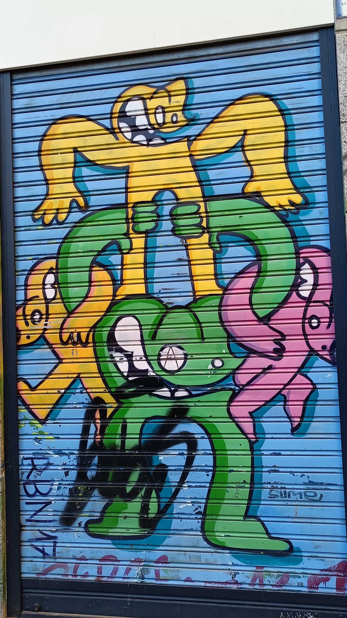 Colourful Cartoon Character Trio — Street art in Madrid
