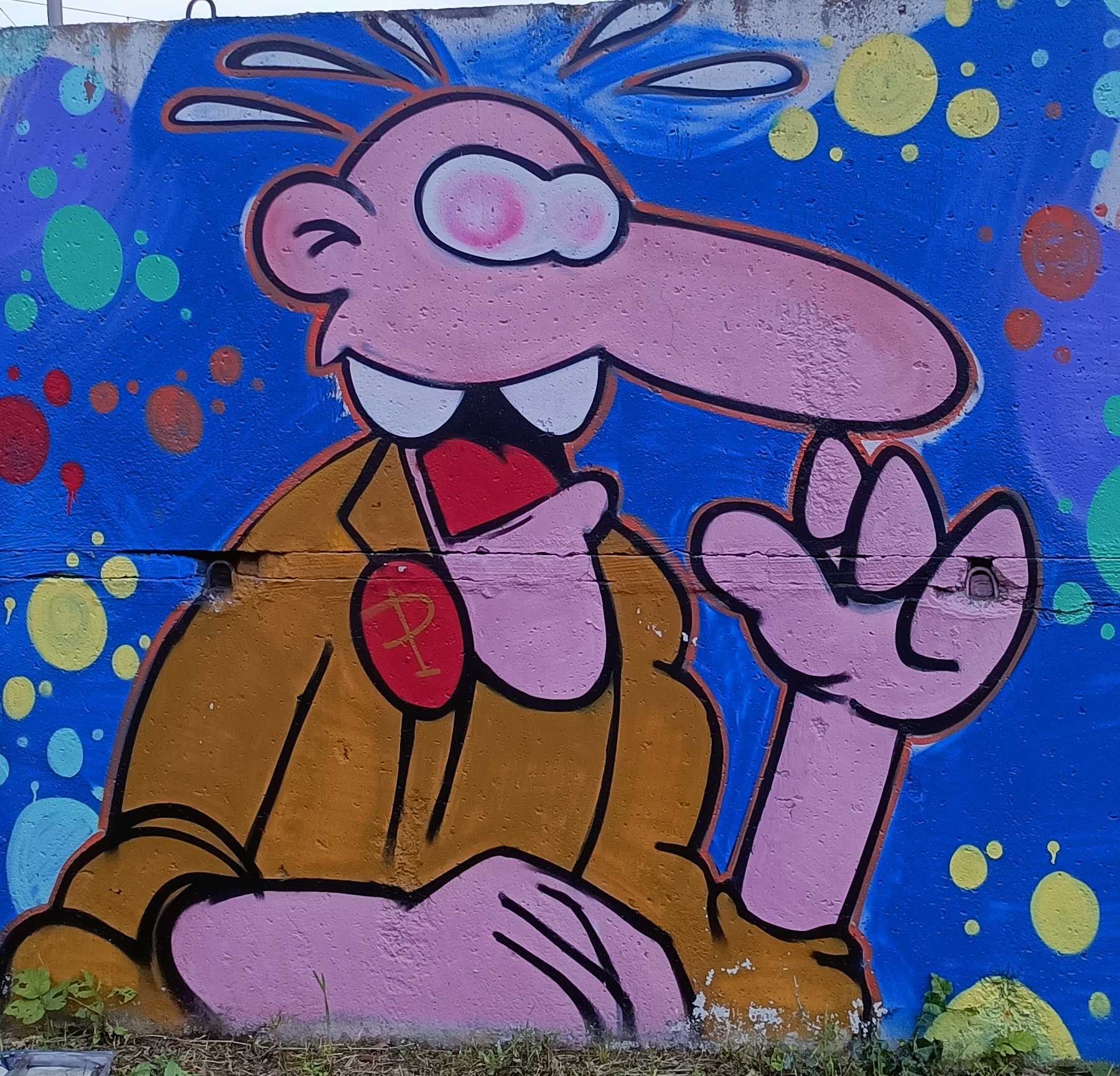 Big-Nosed Pink Character — Street art in Berlin