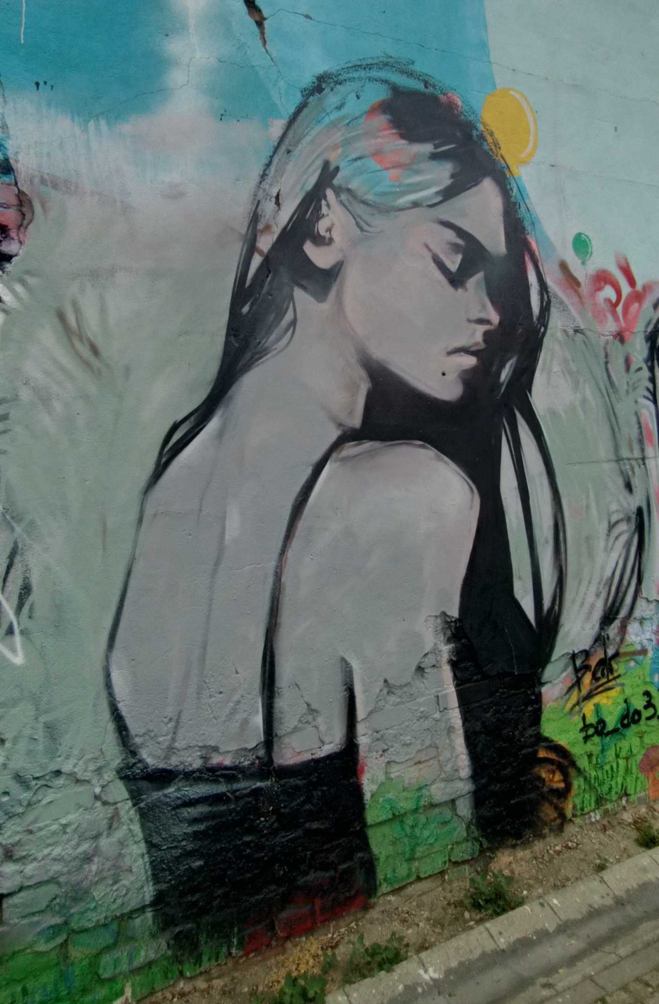 Melancholic Female Profile — Street art in Prague