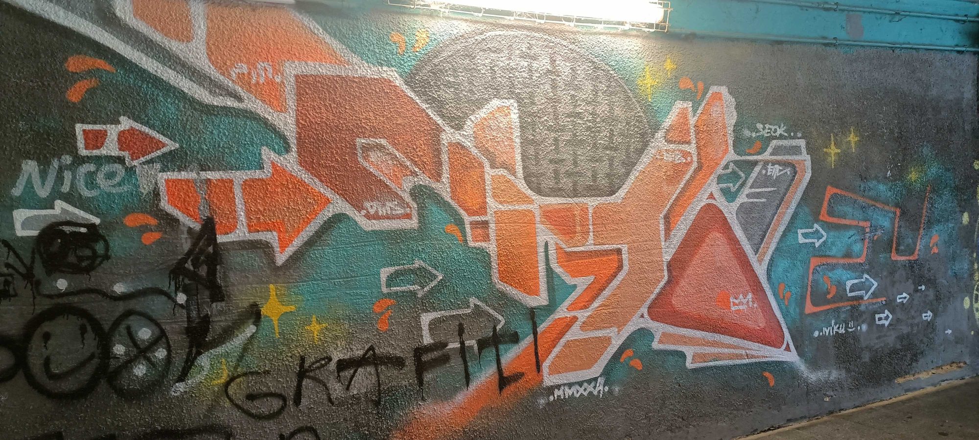 Orange Wildstyle Piece in a Tunnel — Street art in Prague