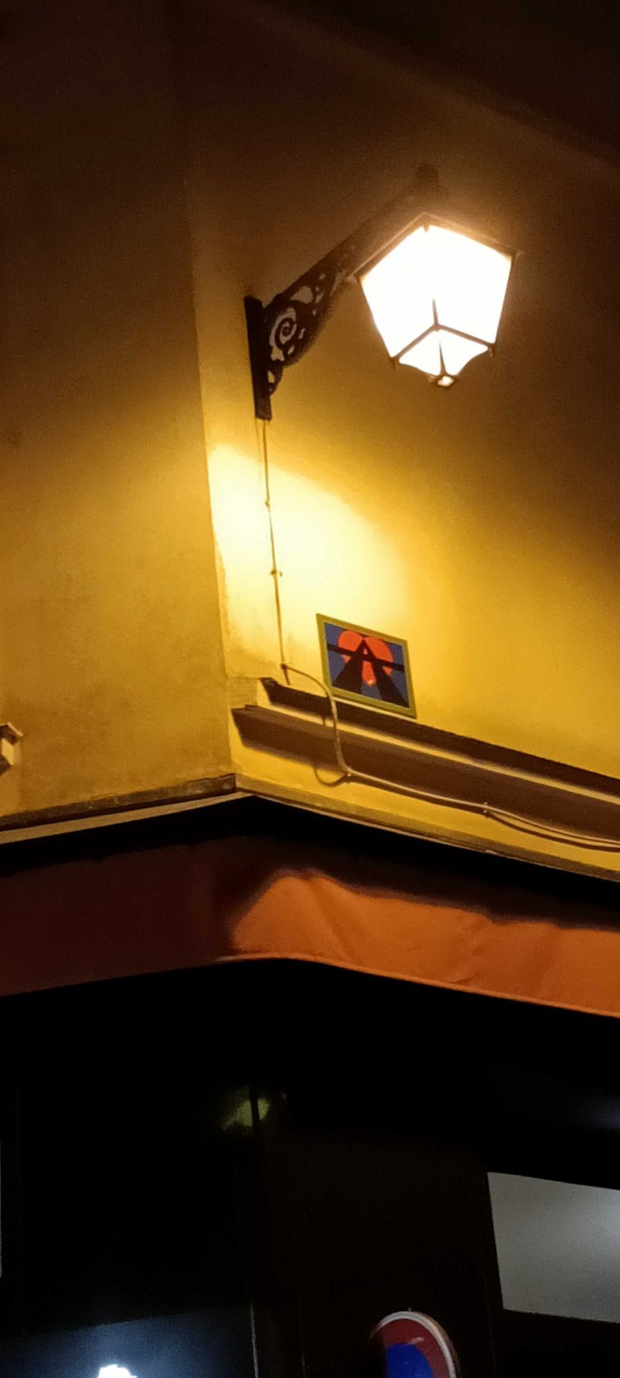 A2 Sticker Under the Lantern — Street art by A2 in Paris