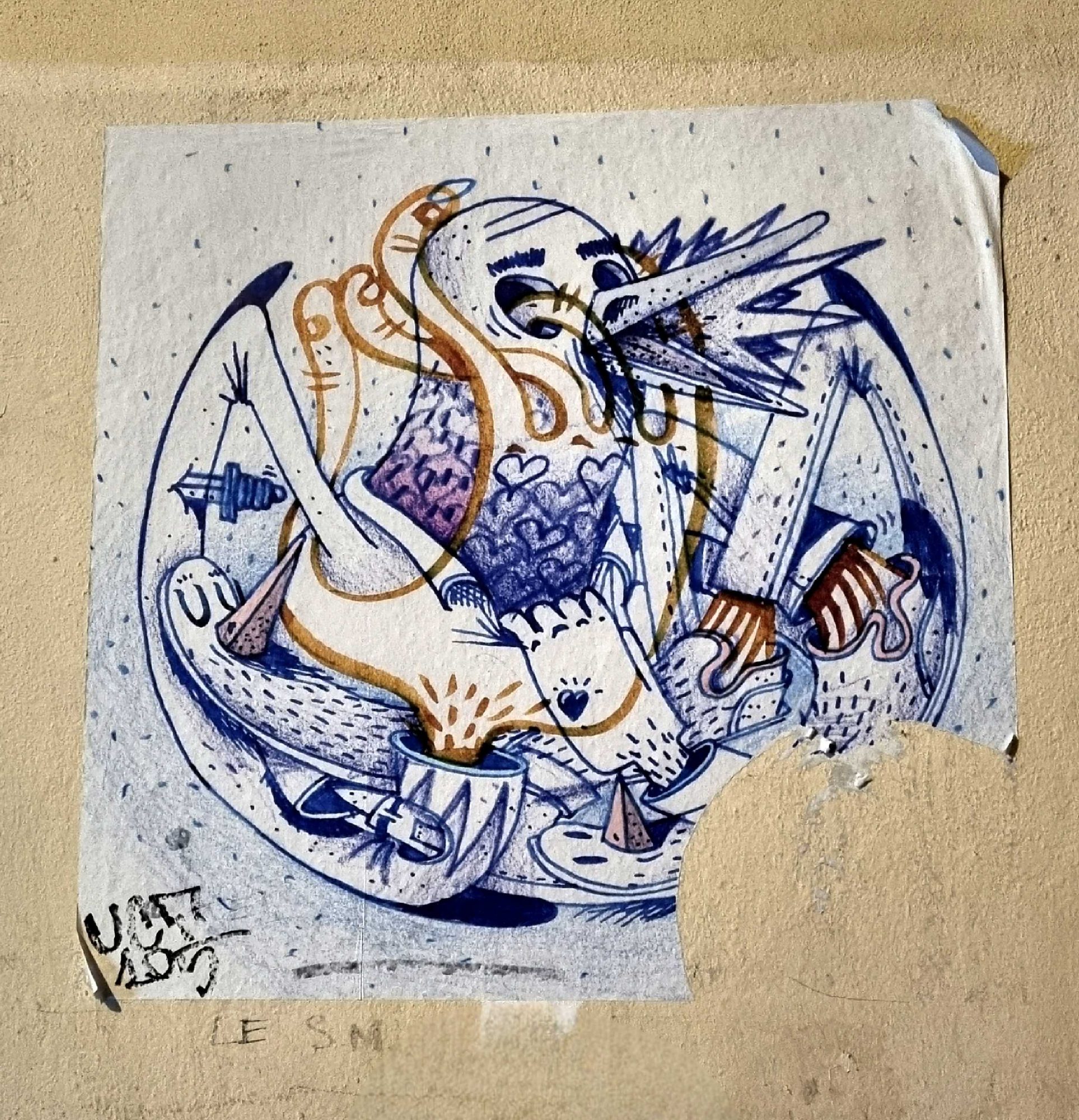 Dessin à l'encre bleue collé au mur — Street art à Strasbourg