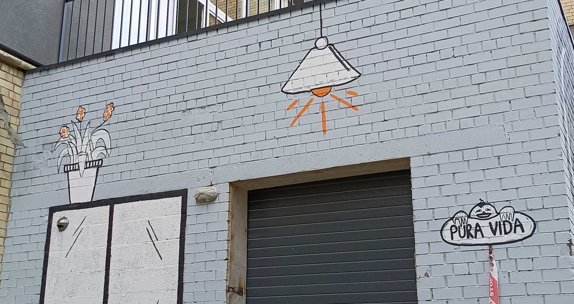 The Lamp and the Pura Vida — Street art in Vilnius