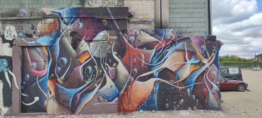 Organic Mural in Blue and Rust — Street art in Coulounieix-Chamiers