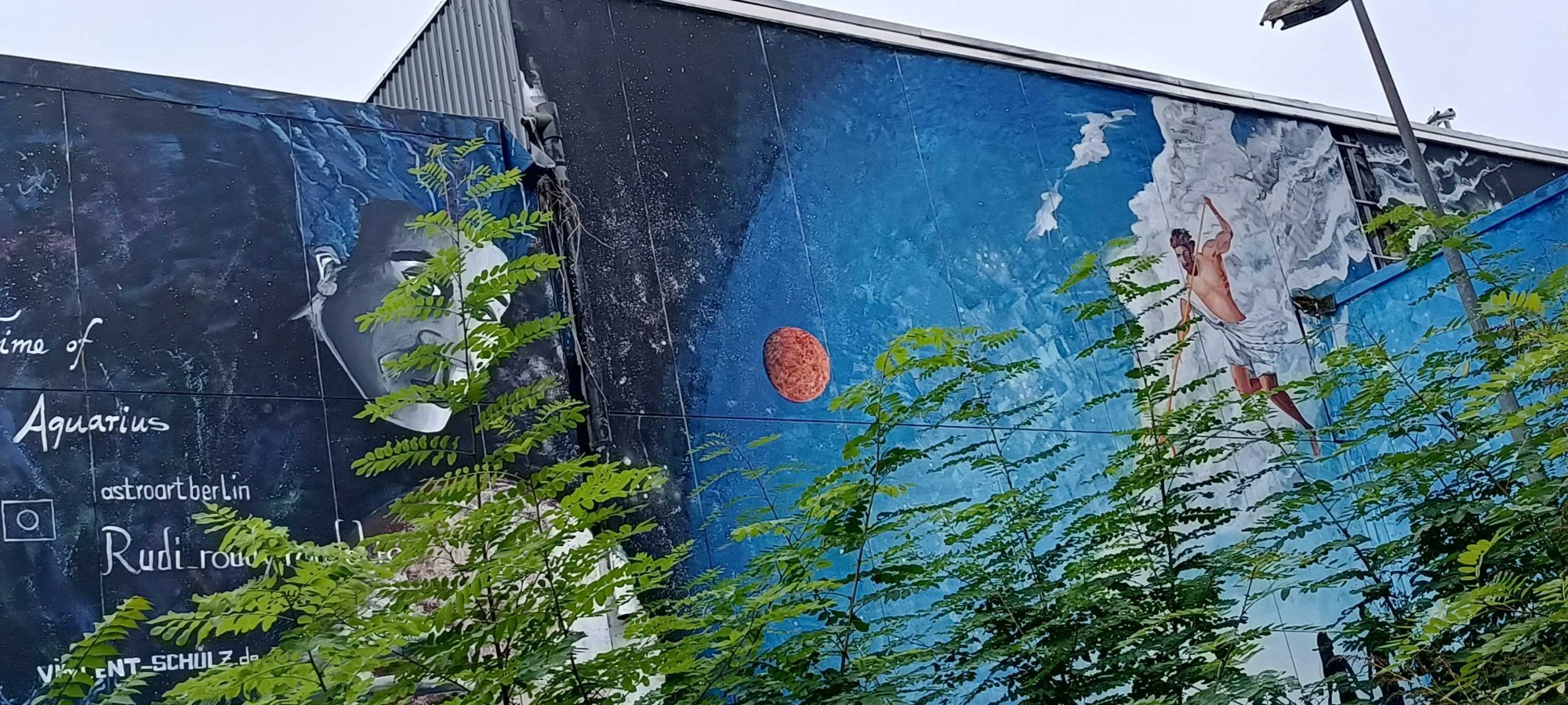 Woman and Natural Landscape — Street art in Berlin