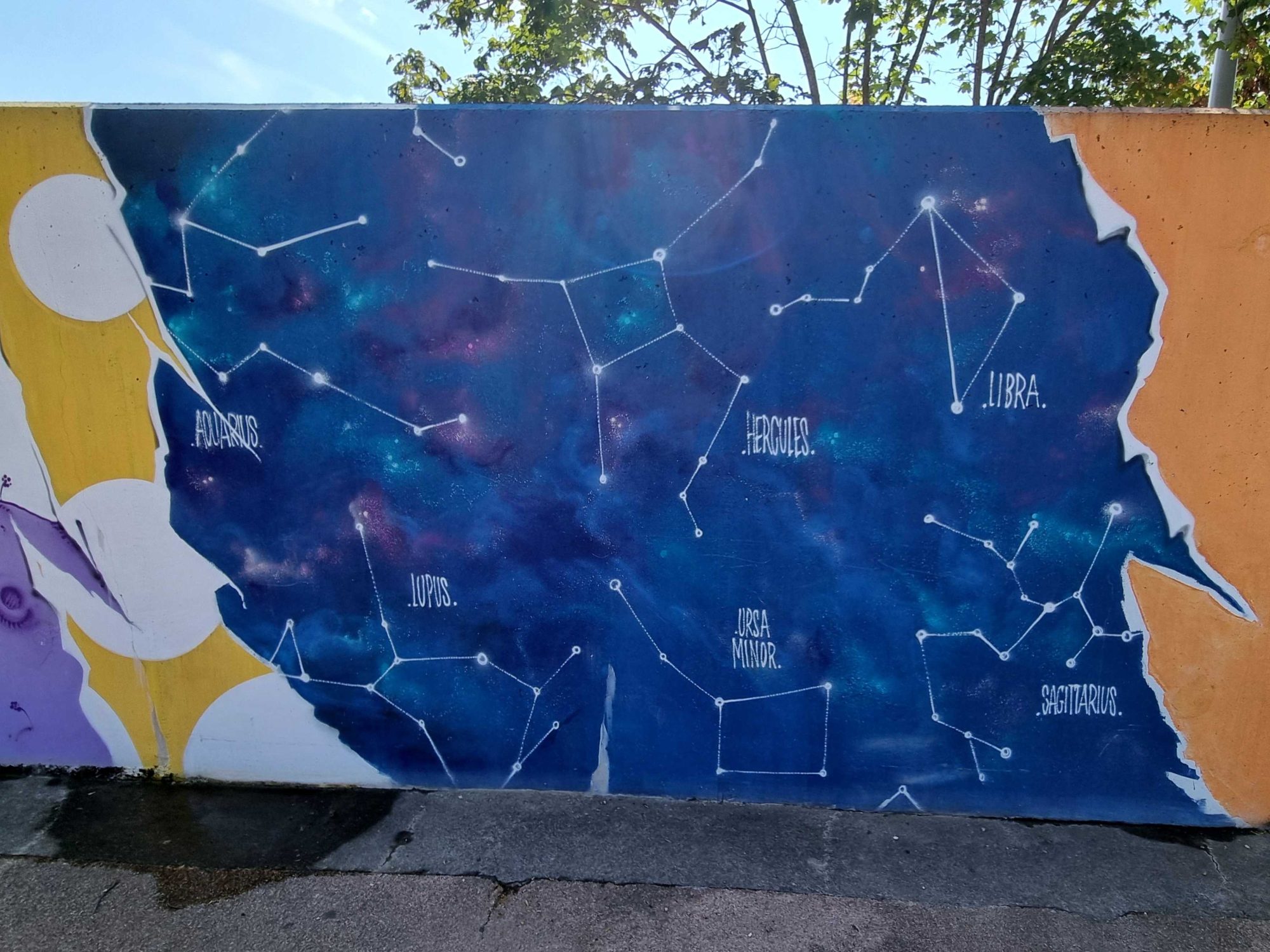 The Star Map in the Torn Wall — Street art in Vallon-Pont-d'Arc