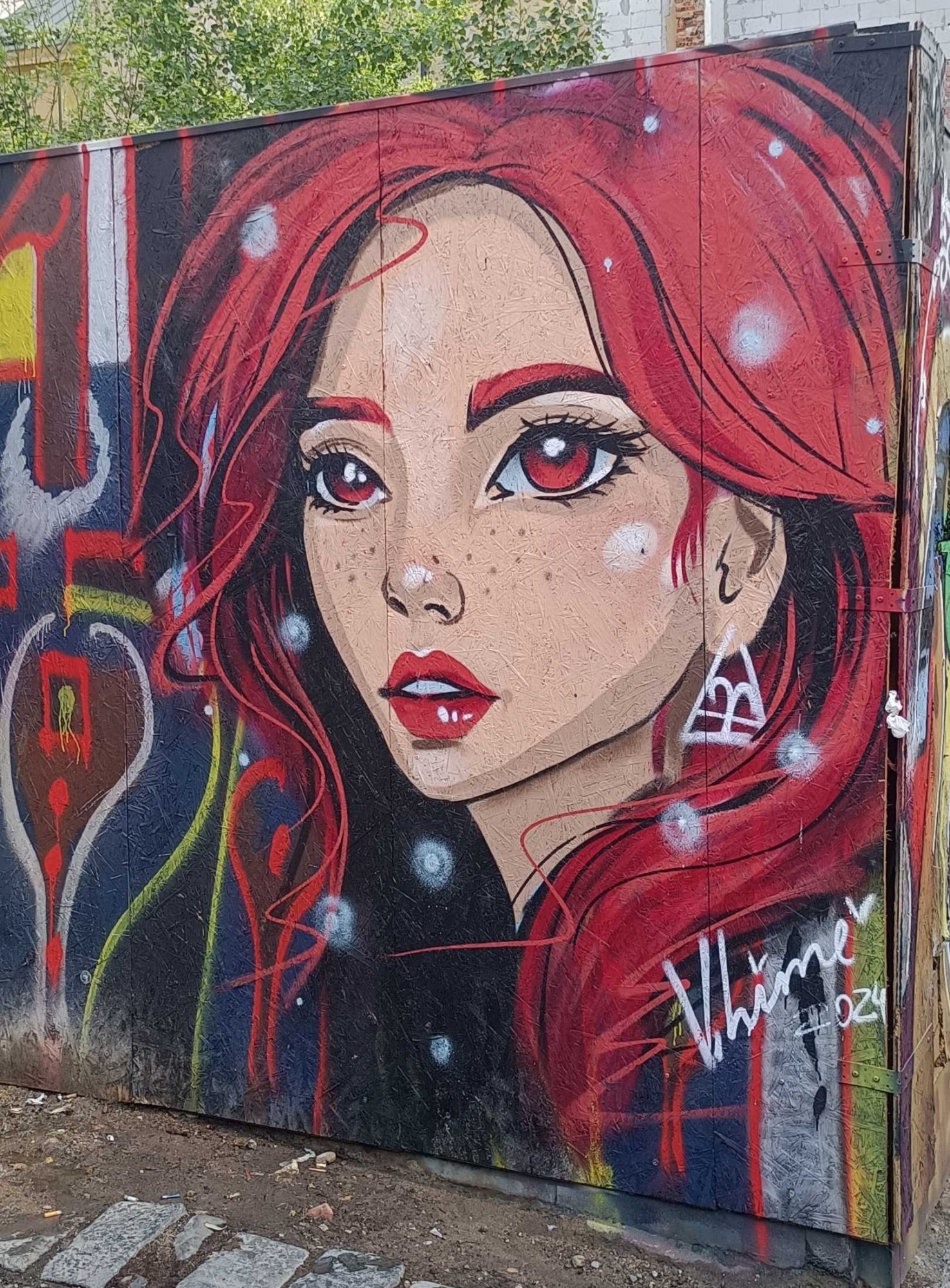 Girl with Red Hair — Street art in Prague