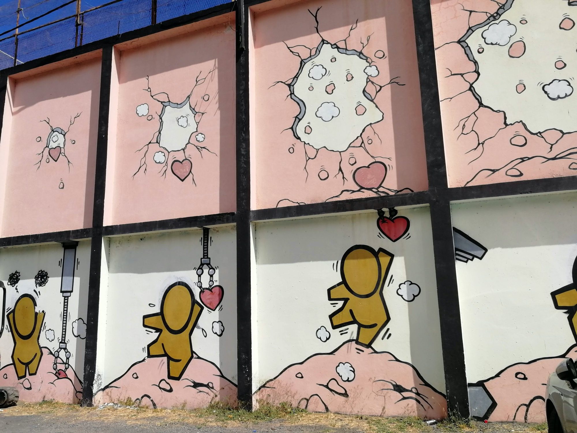 Gouzous et les cœurs brisés — Street art de Jace à Saint-Leu