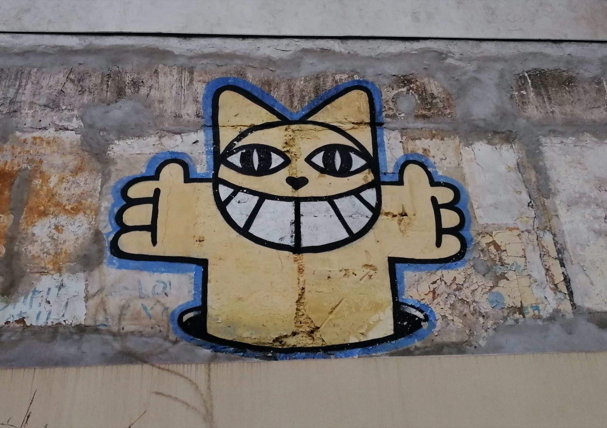 M. Chat Smiling, Paris 10th — Street art by M. Chat in Paris