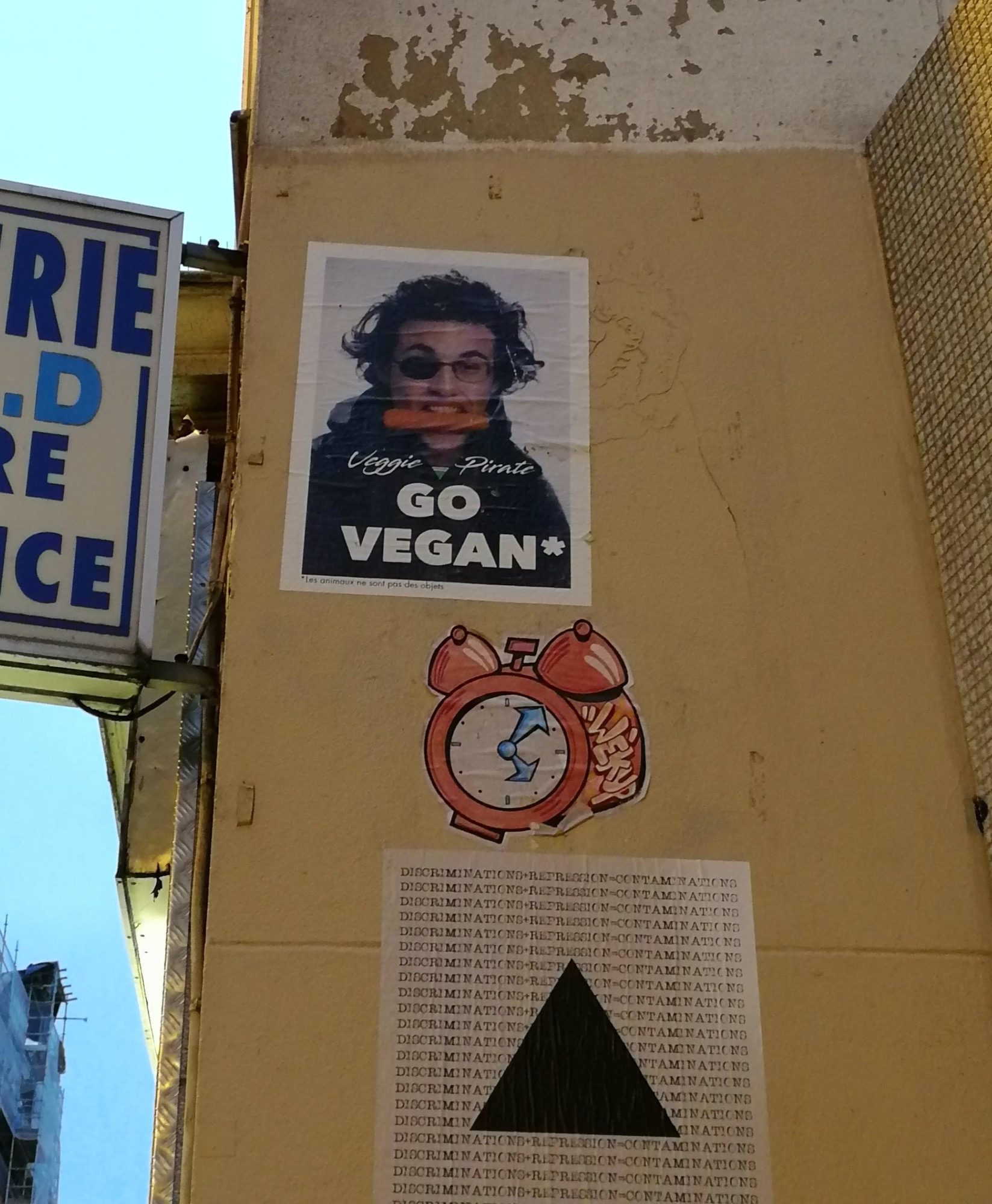 Activist Paste-ups Rue Sampaix — Street art by John Hamon in Paris