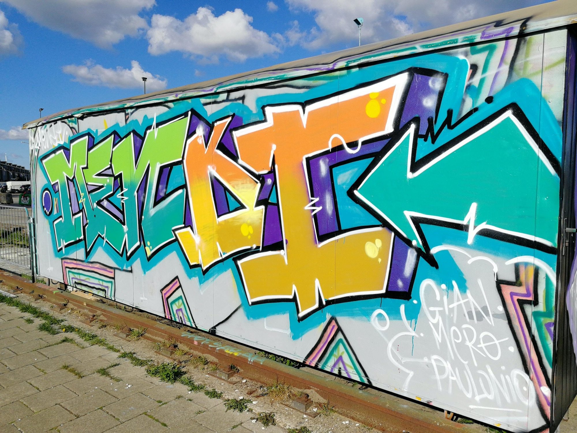 Turquoise and Orange Wildstyle — Street art in Amsterdam