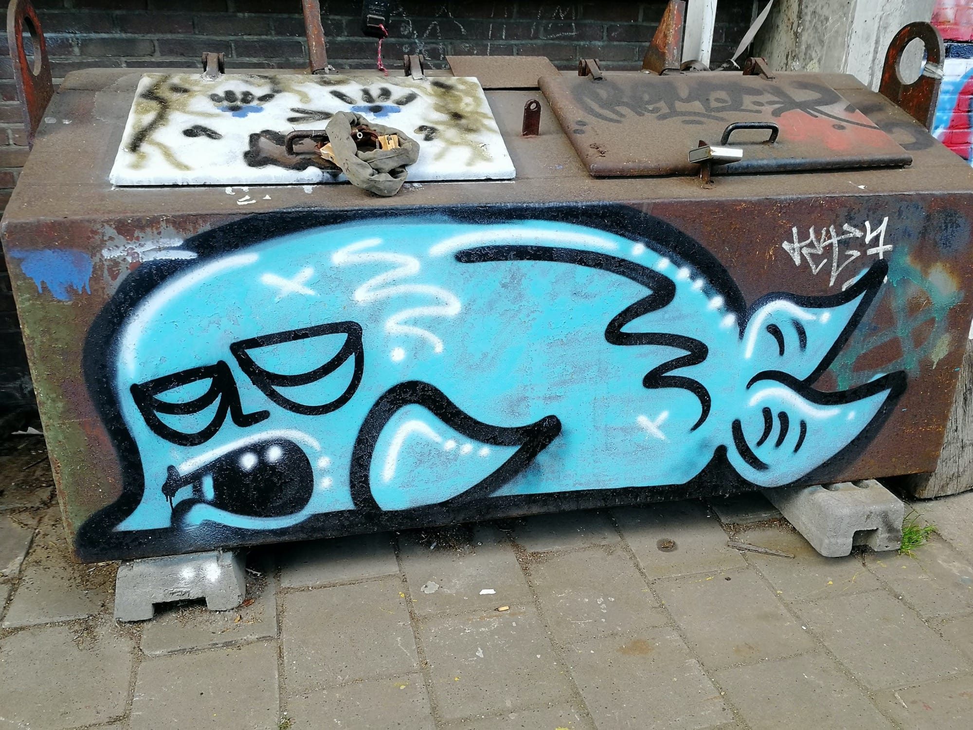 Melancholy Blue Pig — Street art in Amsterdam