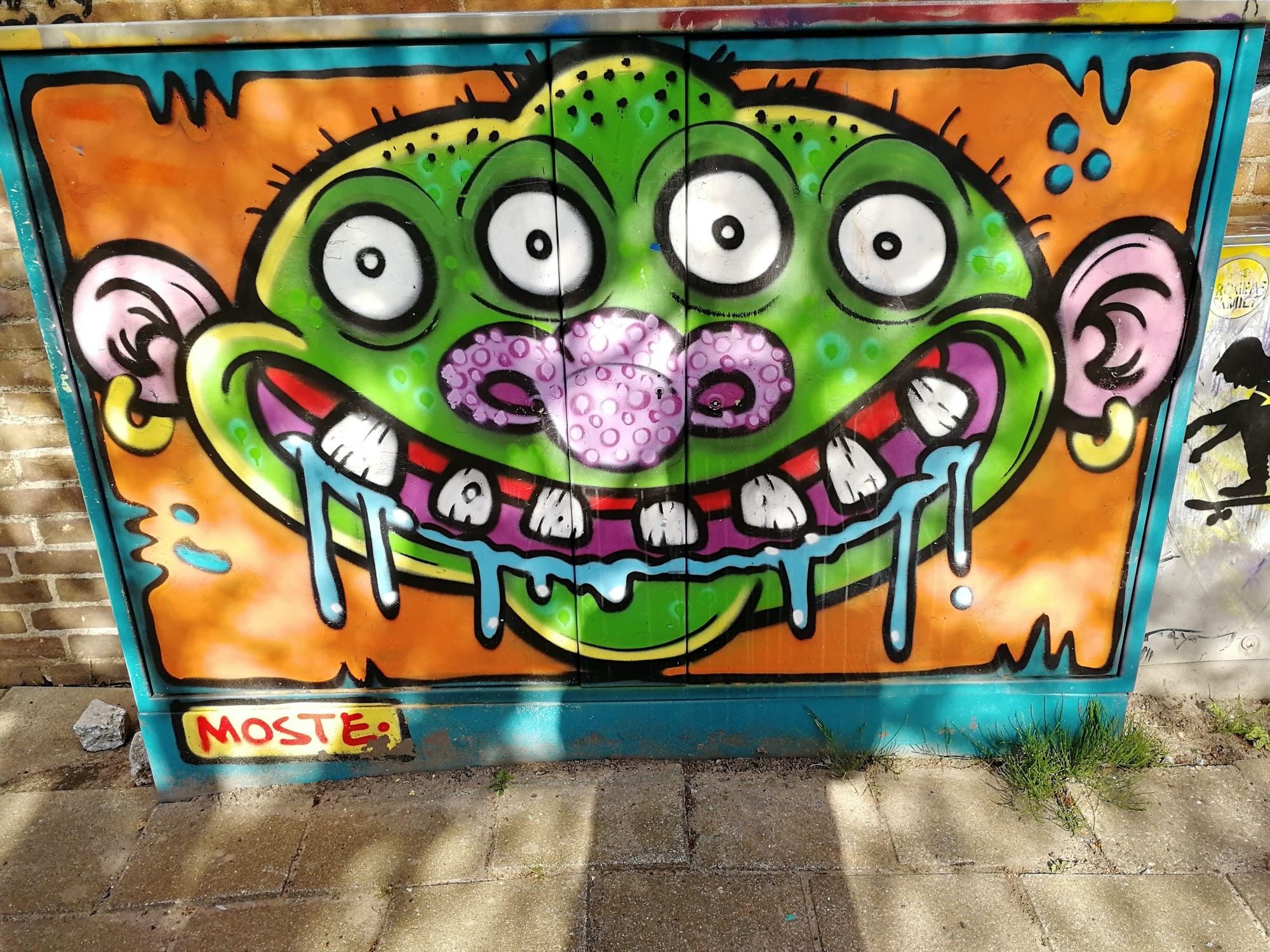 Drooling Green Monster by Moste — Street art in Amsterdam