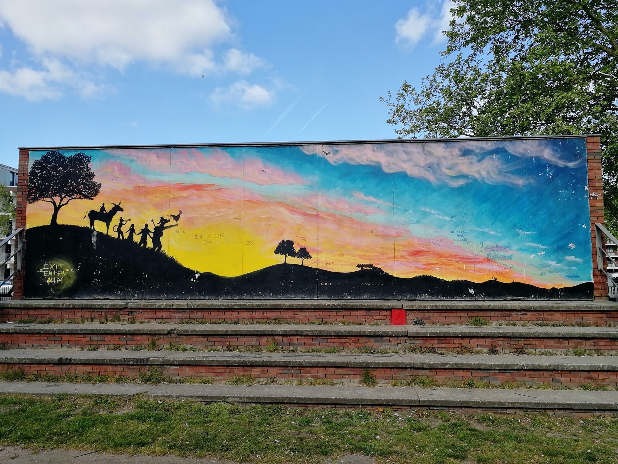 Silhouettes au coucher de soleil — Street art à Amsterdam