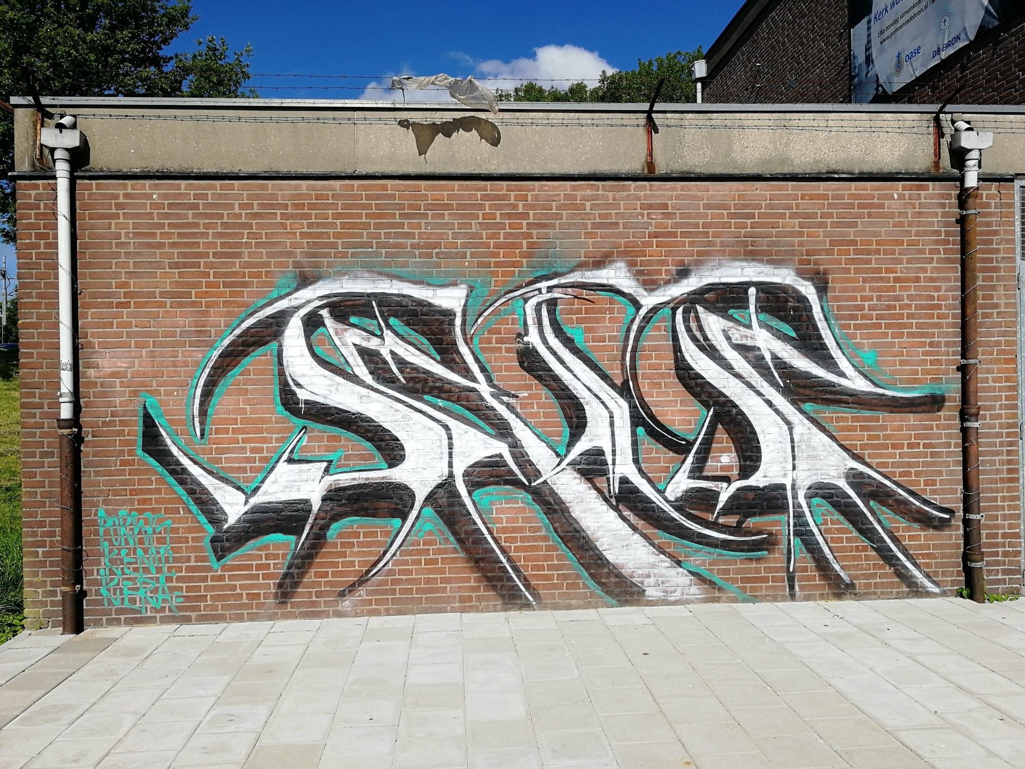 Chrome SNG Wildstyle on Brick Wall — Street art in Amsterdam