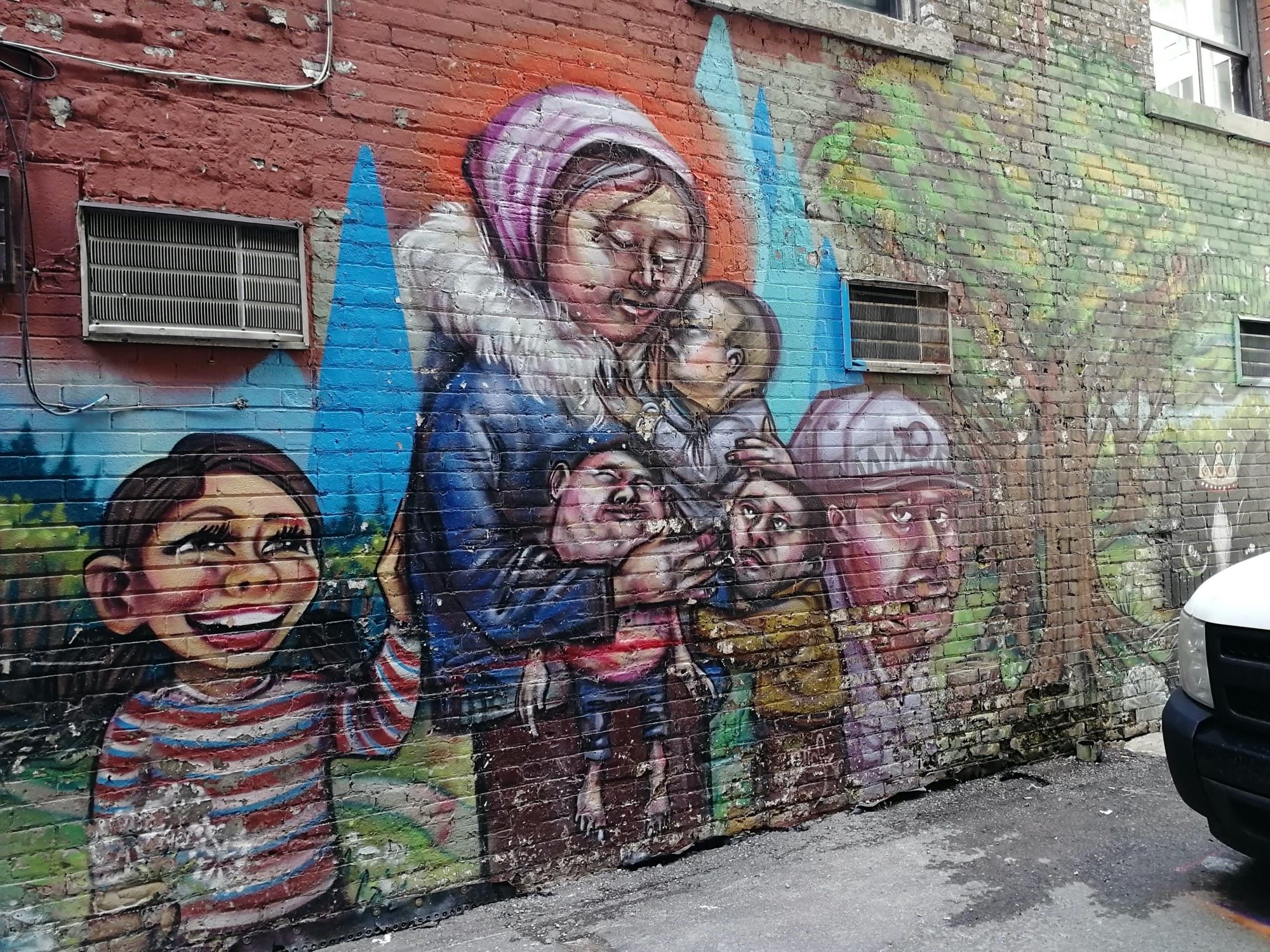 Tender Mother and Children — Street art in Toronto