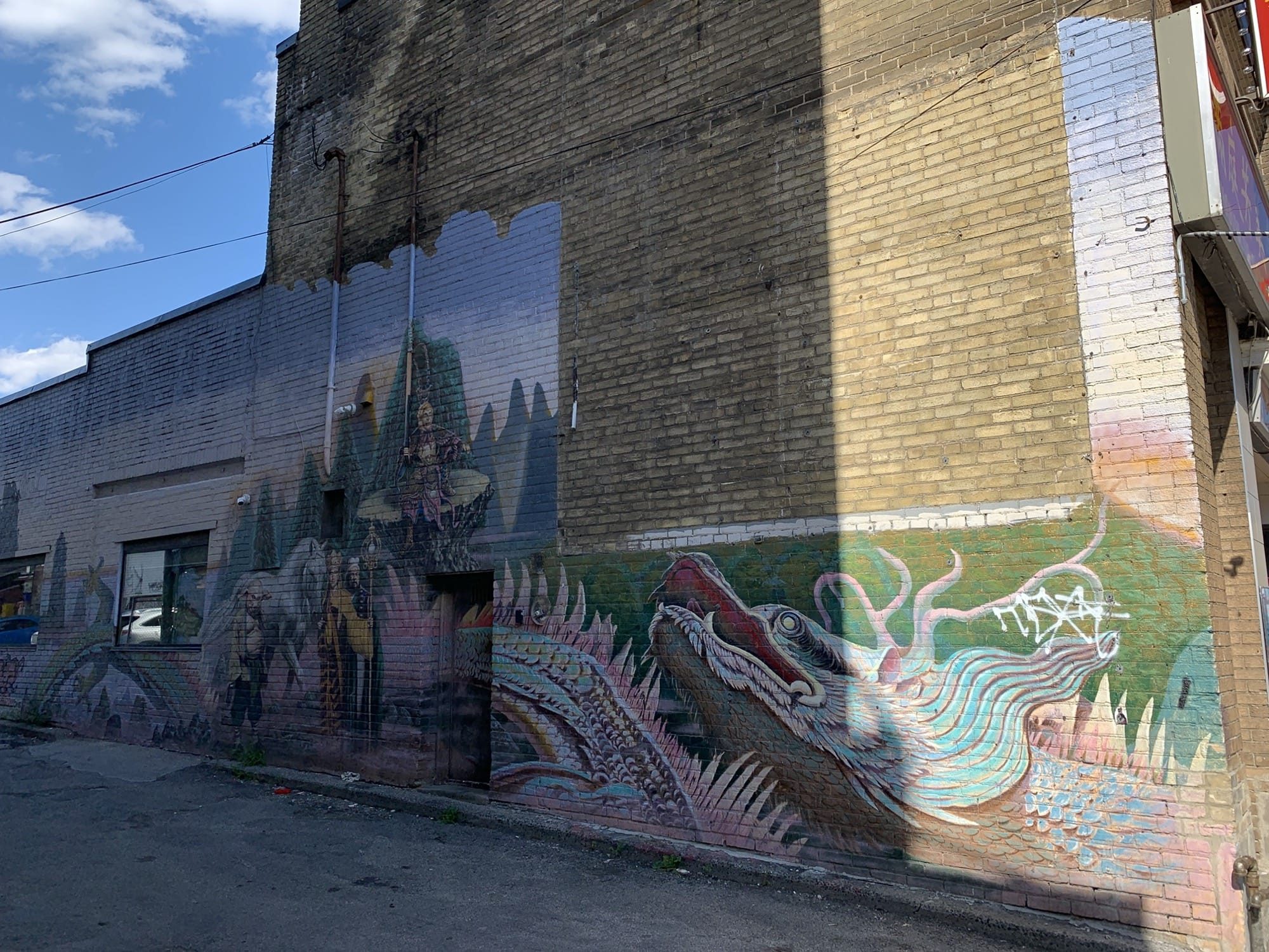 Reflected Urban Dragon — Street art in Toronto