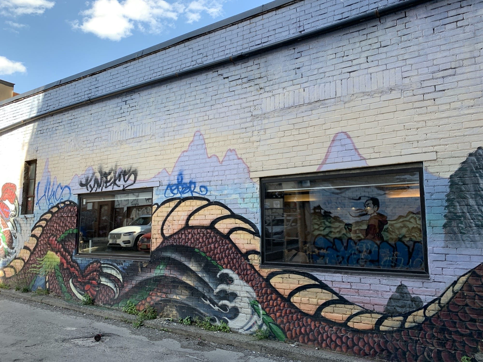 Red Dragon beneath Pink Peaks — Street art in Toronto