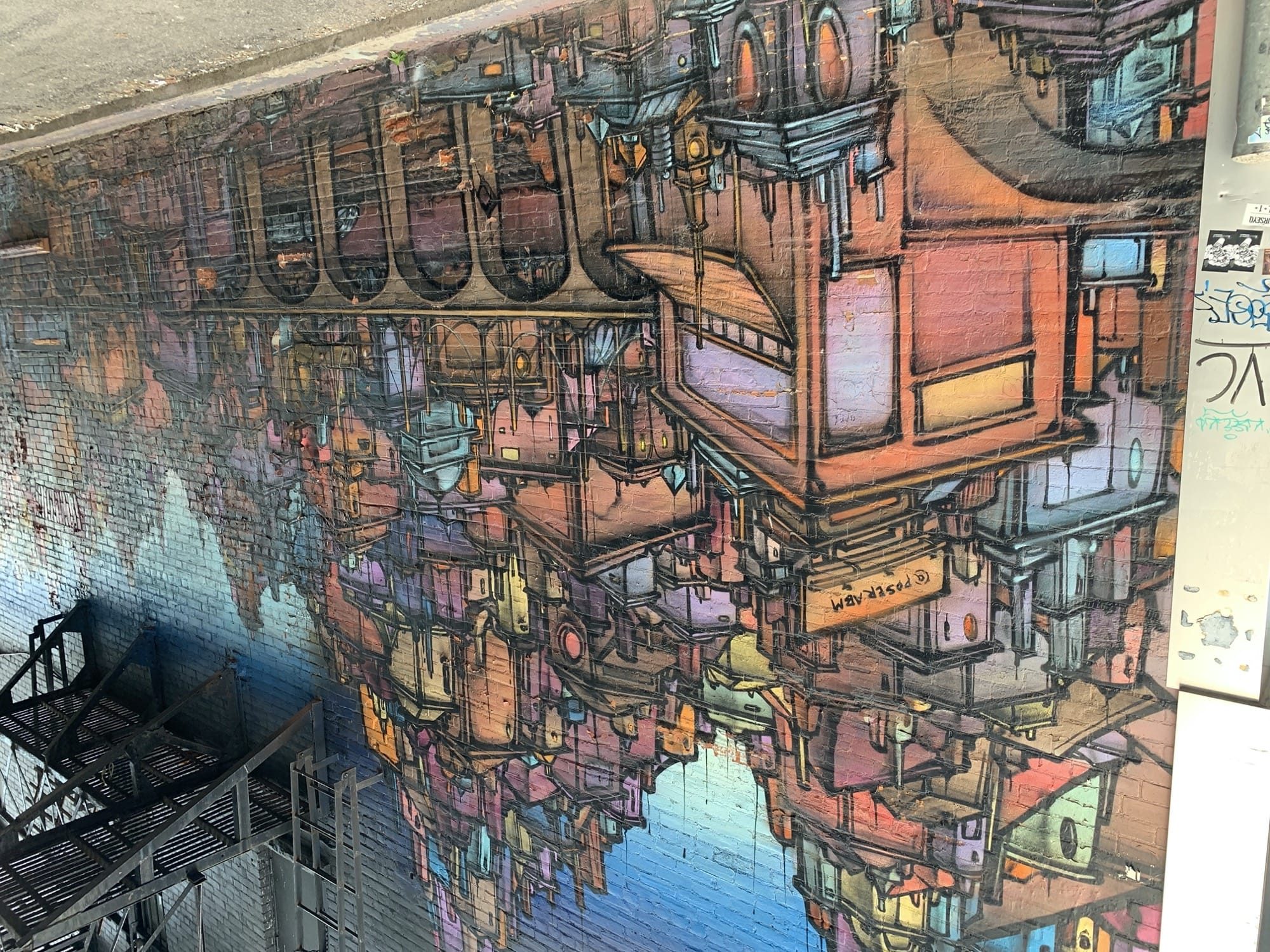 European City Panorama on Brick Wall — Street art in Toronto