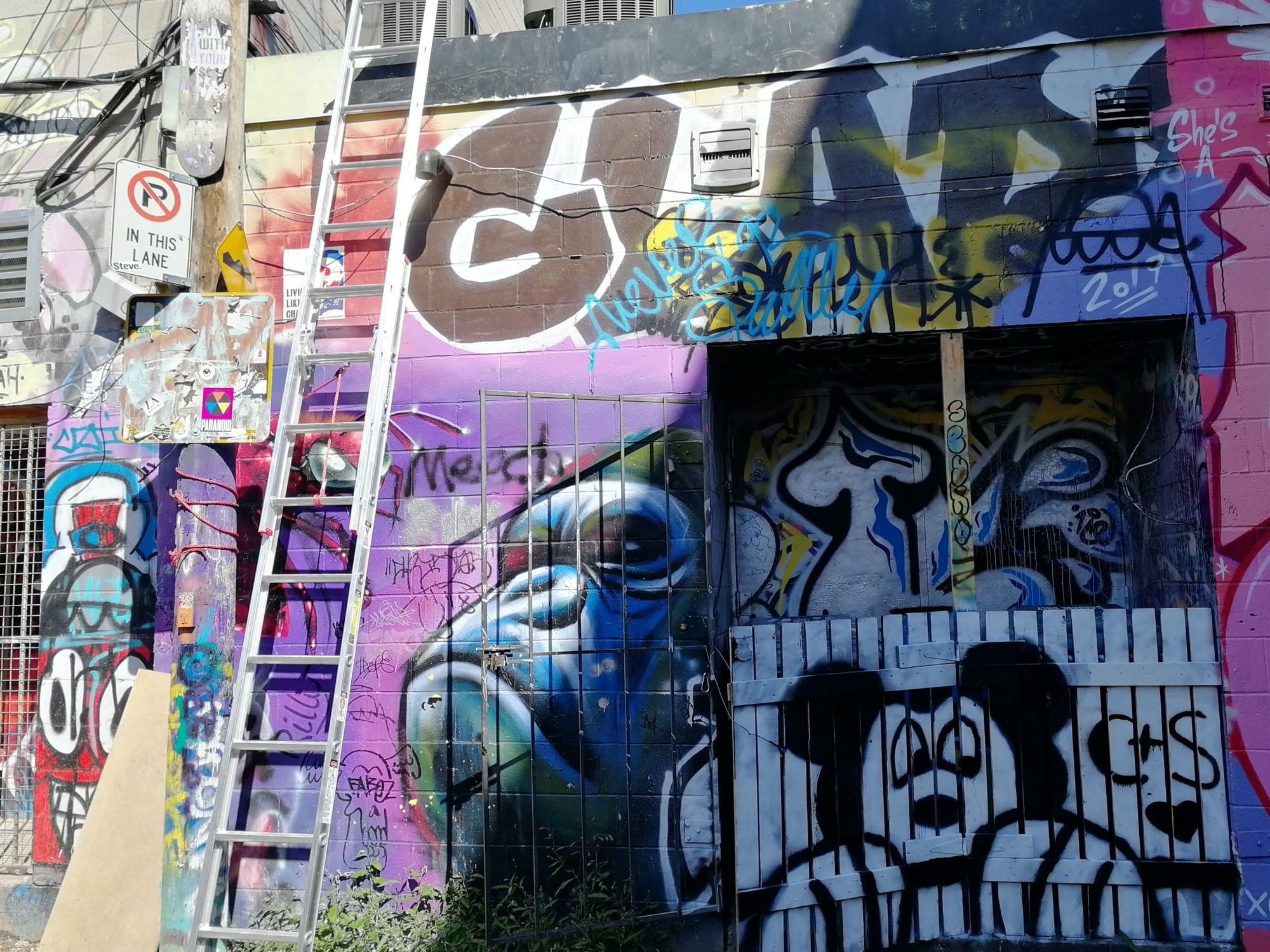 Multilayered graffiti wall Toronto — Street art in Toronto