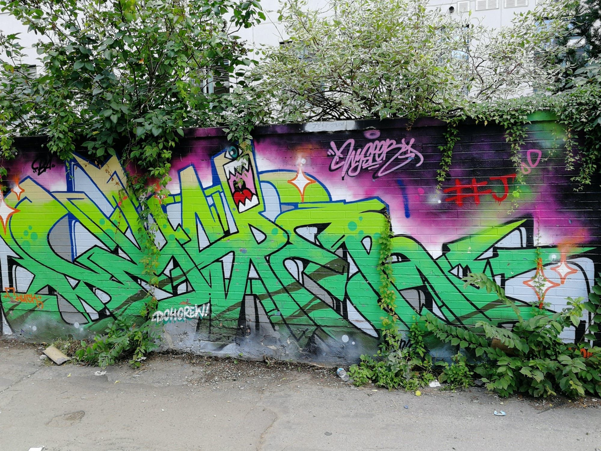 Neon green wildstyle with small monster — Street art in Toronto