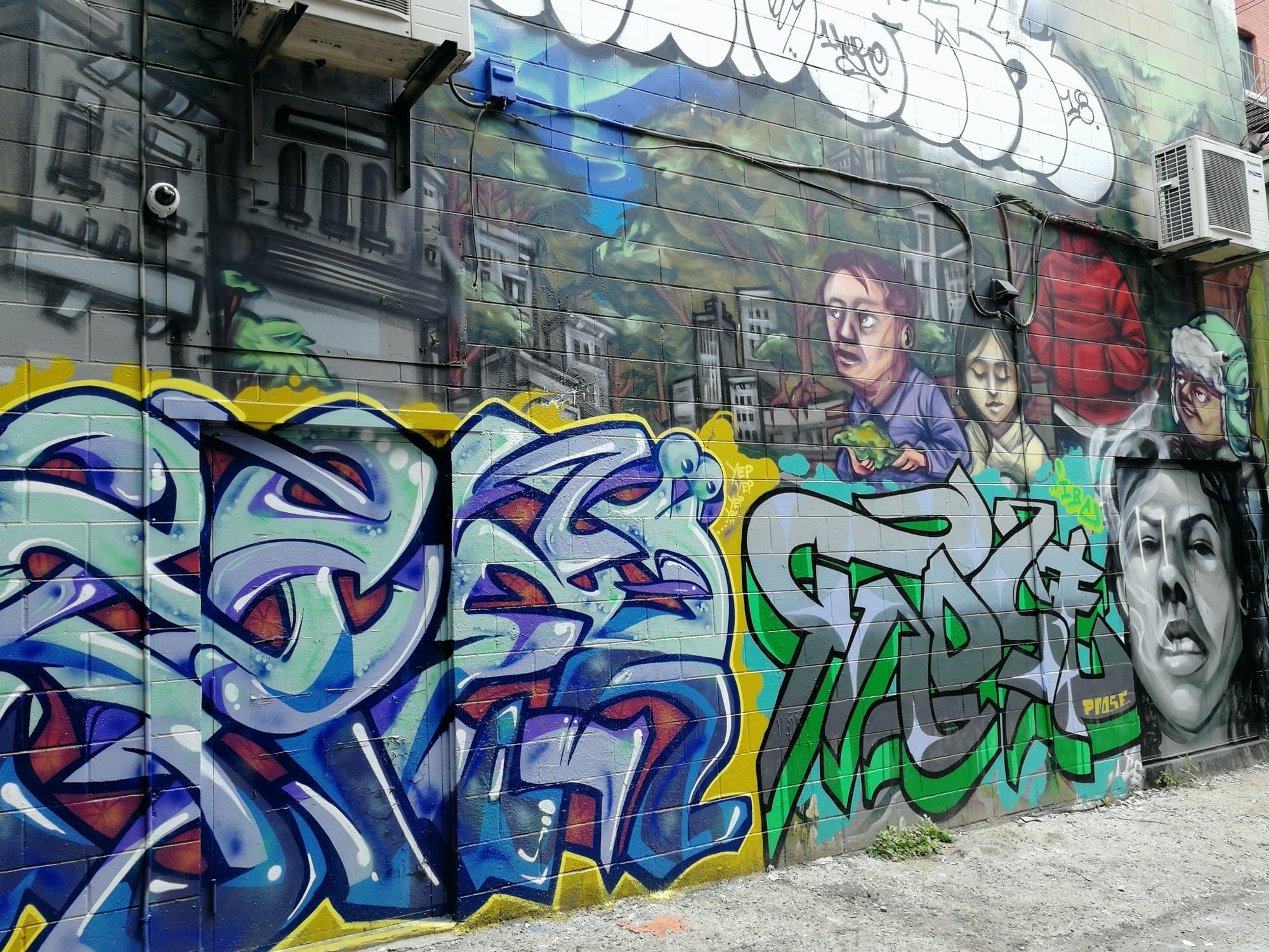Mixed mural urban portraits and wildstyle — Street art in Toronto