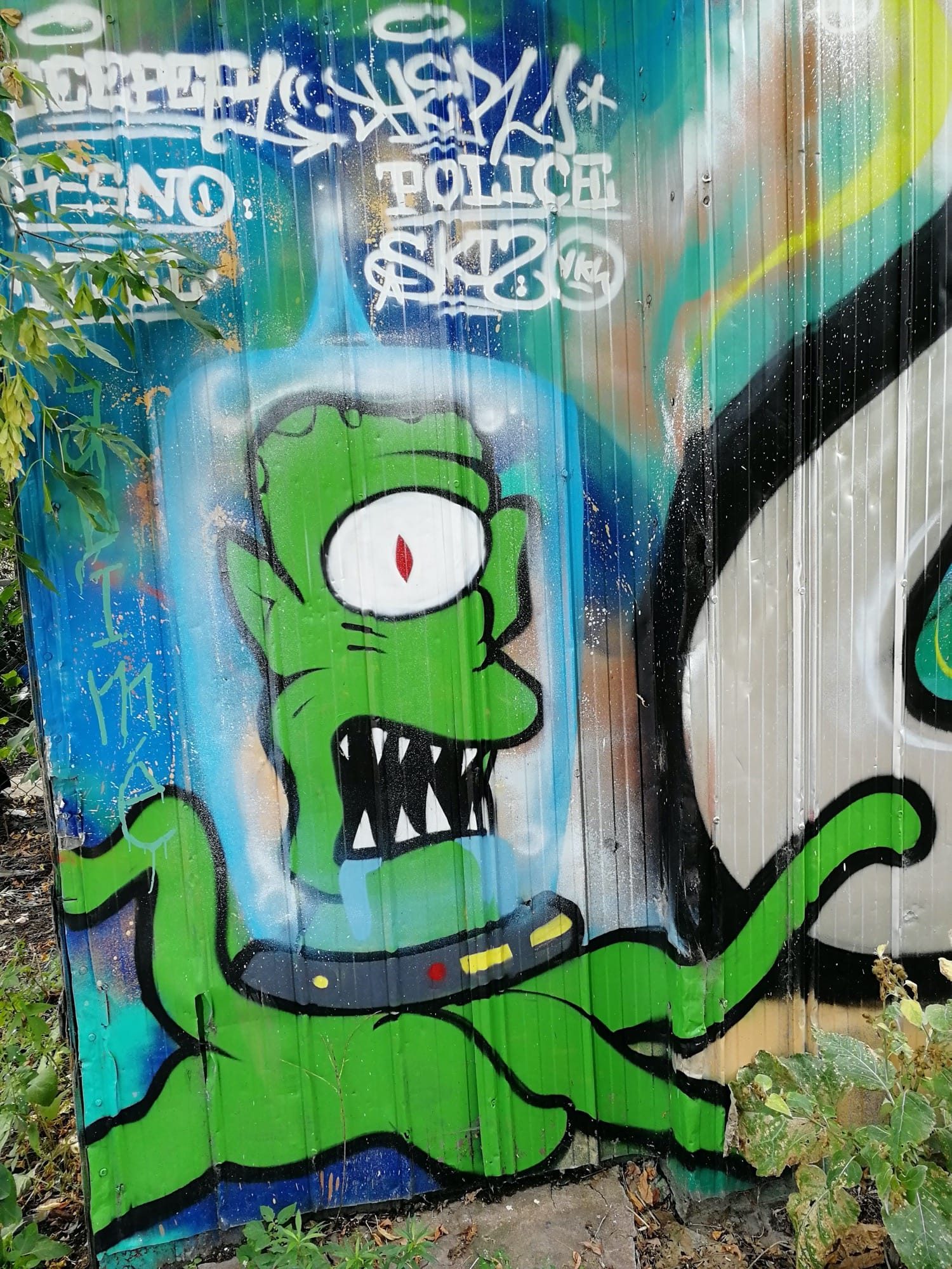 The One-Eyed Green Alien — Street art in Montréal