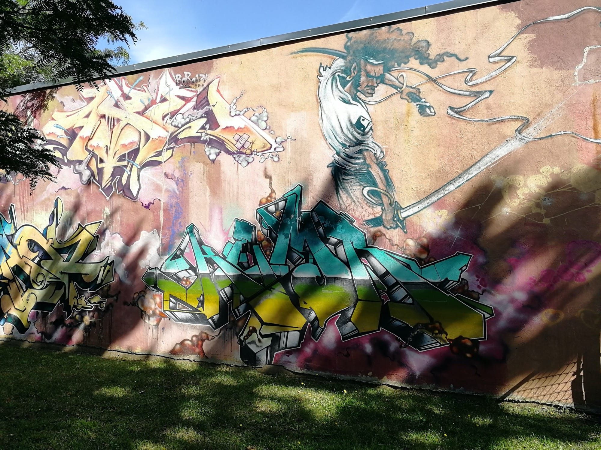Le sabreur à la crinière et les lettres turquoise — Street art à Montréal