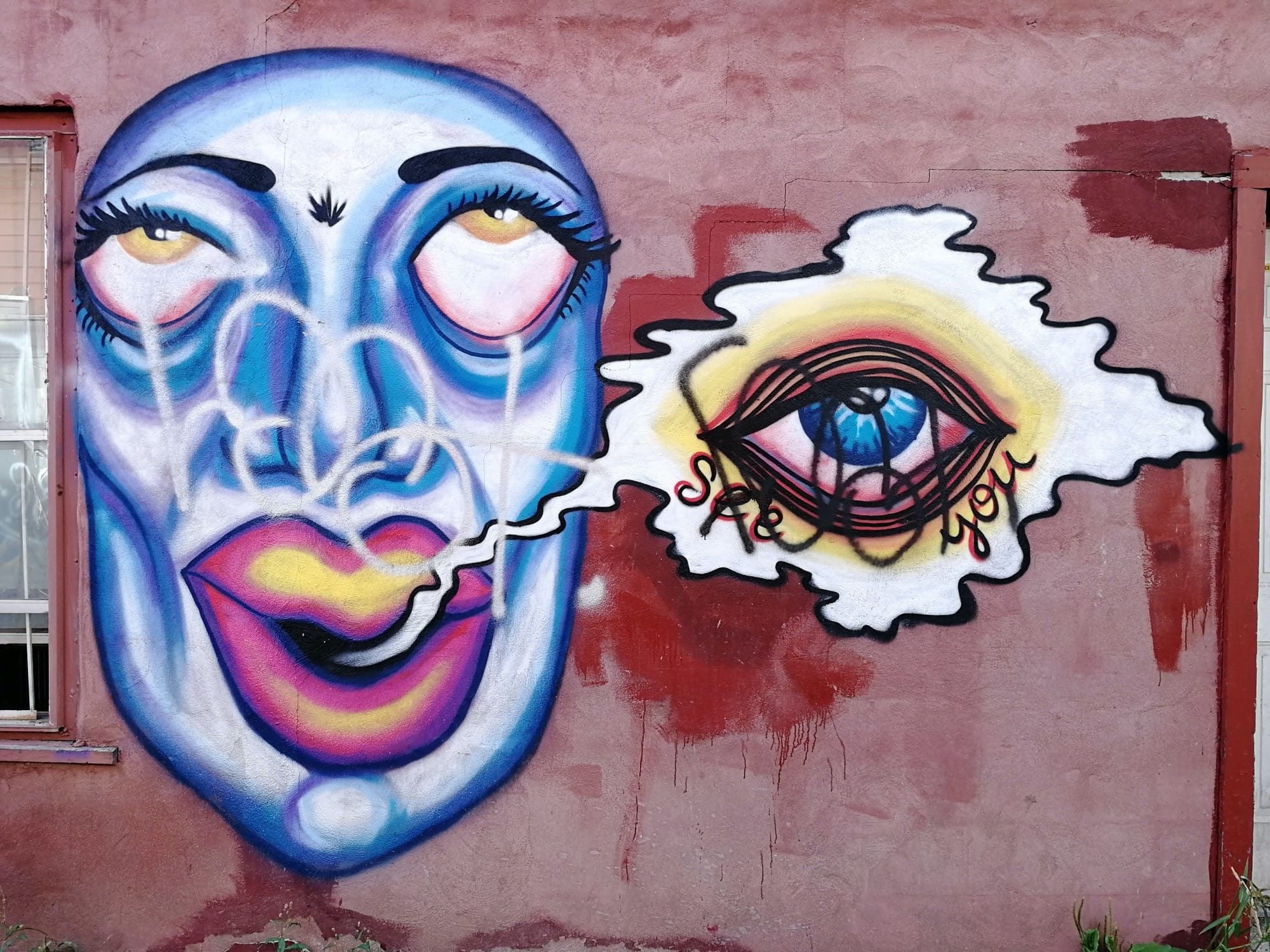 The Blue Mask and the Eye That Says See You — Street art in Montréal