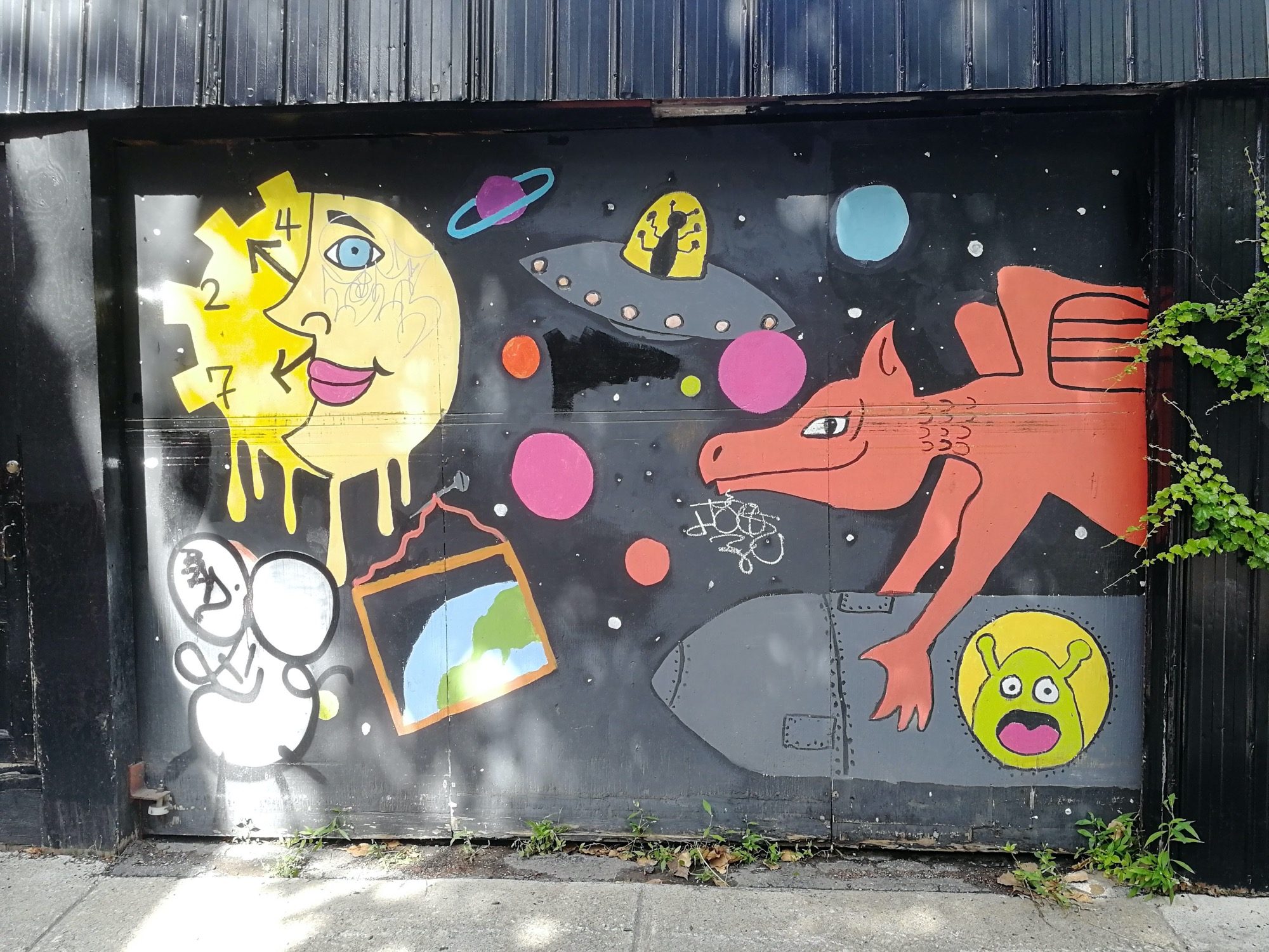 The Red Dragon and the Flying Saucer — Street art in Montréal