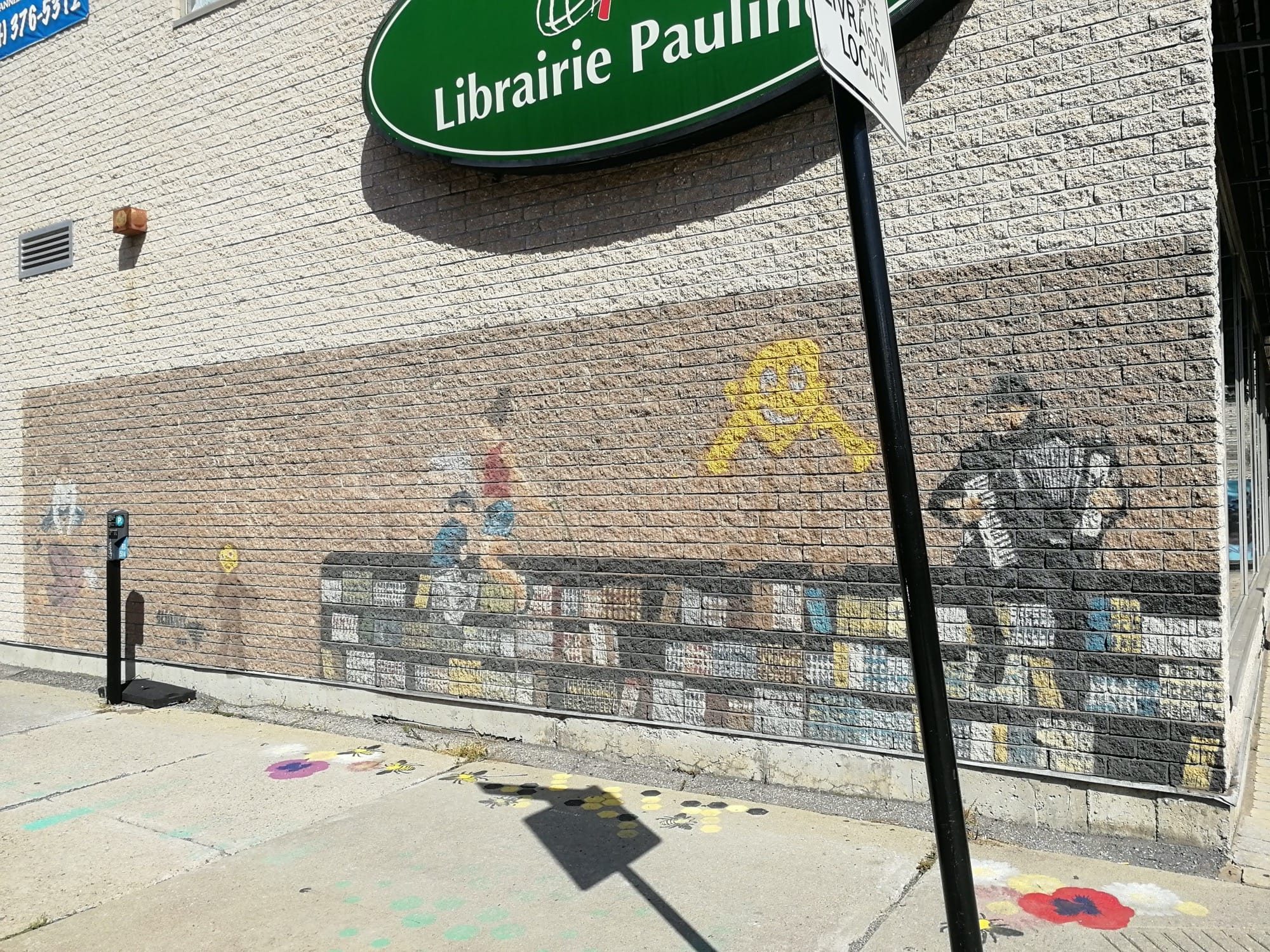 The Painted Bookshelf of Librairie Paulines — Street art in Montréal