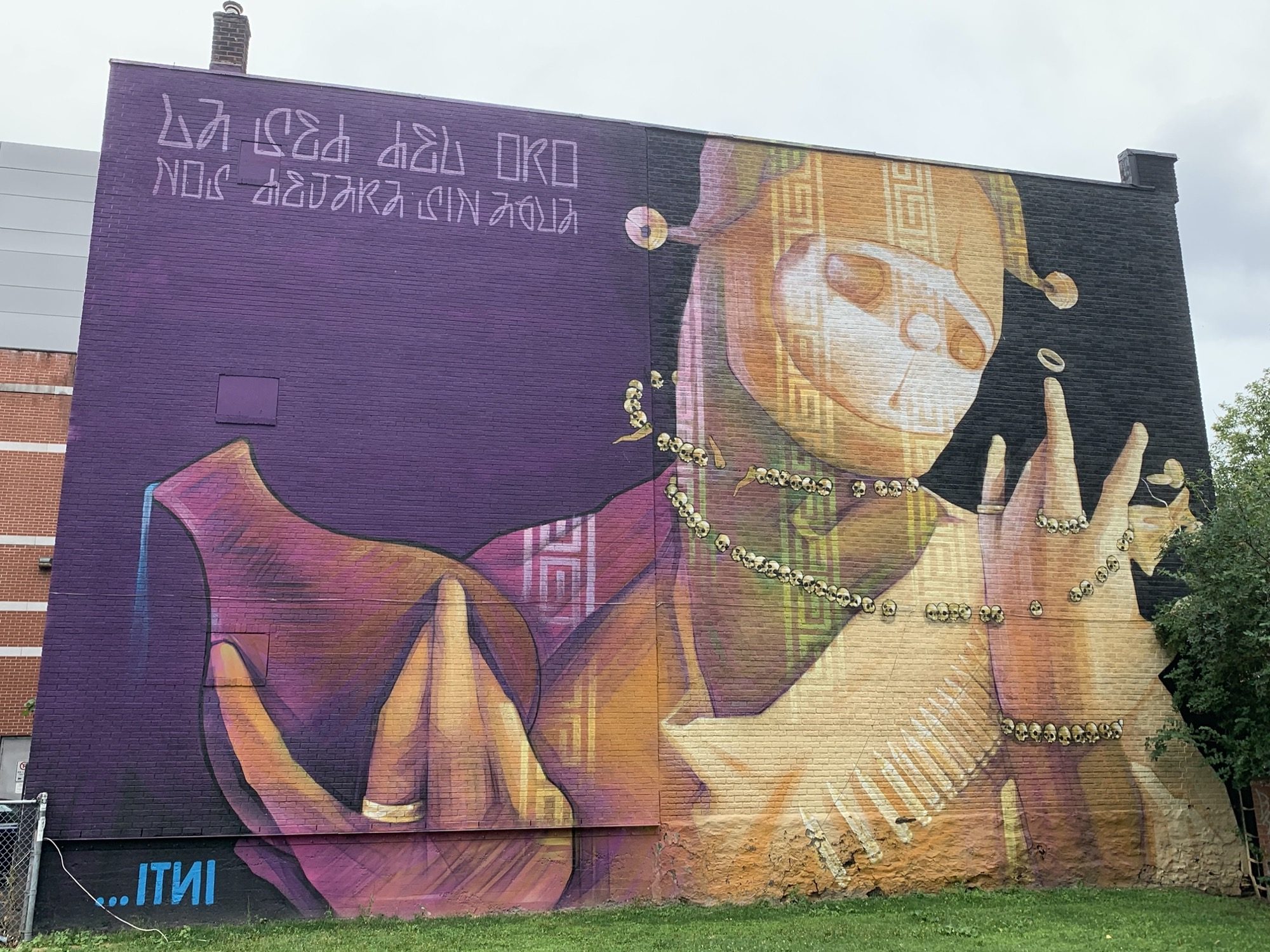 The Figure in a Golden Mask, by Inti — Street art by Inti in Montréal