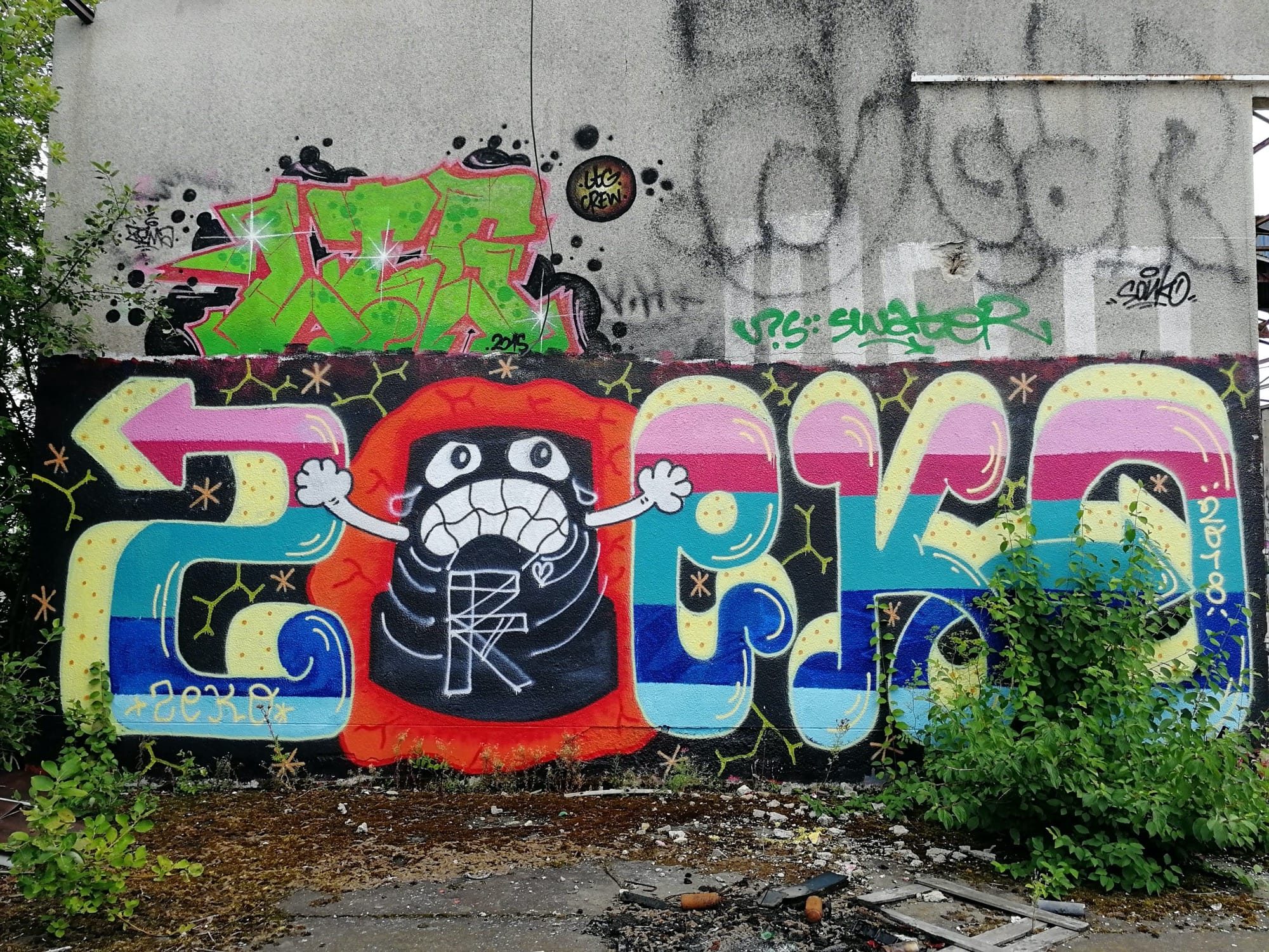 Lettrage ZOKA et créature hurlante — Street art à Chantepie