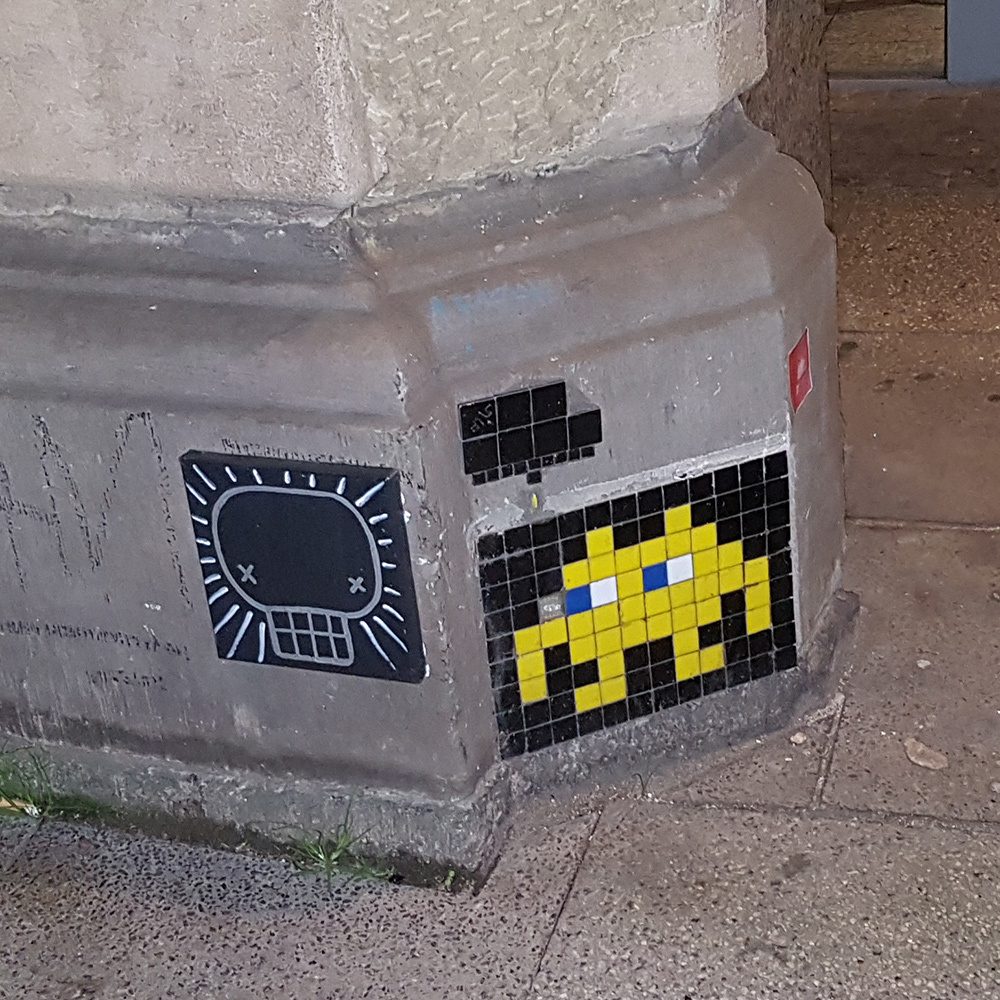 Roka meets Invader — Street art by Invader, ROKA in Köln