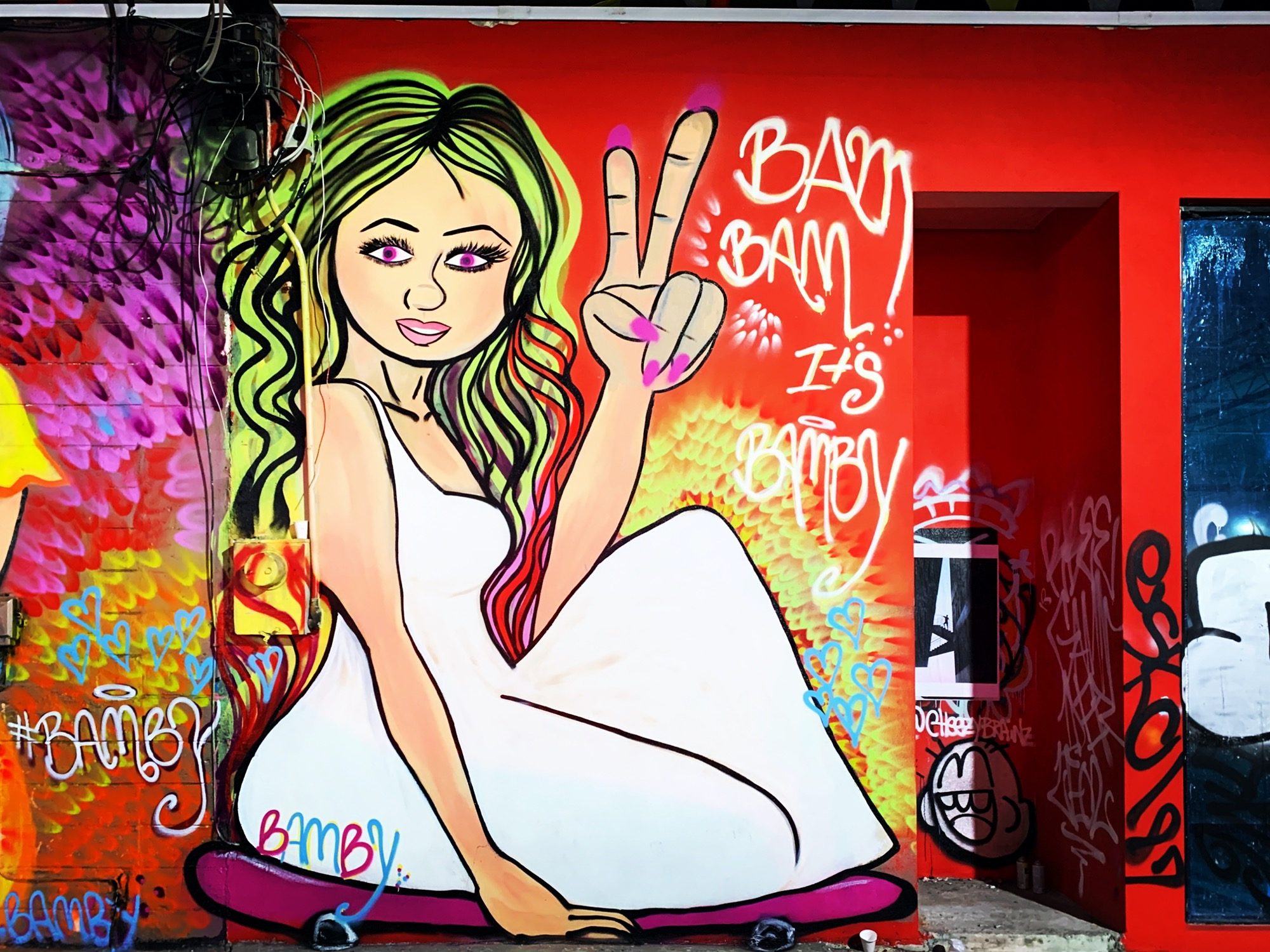 Bamby - Girl with Peace Sign — Street art in Miami